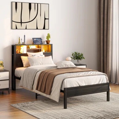 black twin sized metal bed frame with storage headboard (maybe some missing hardware) 