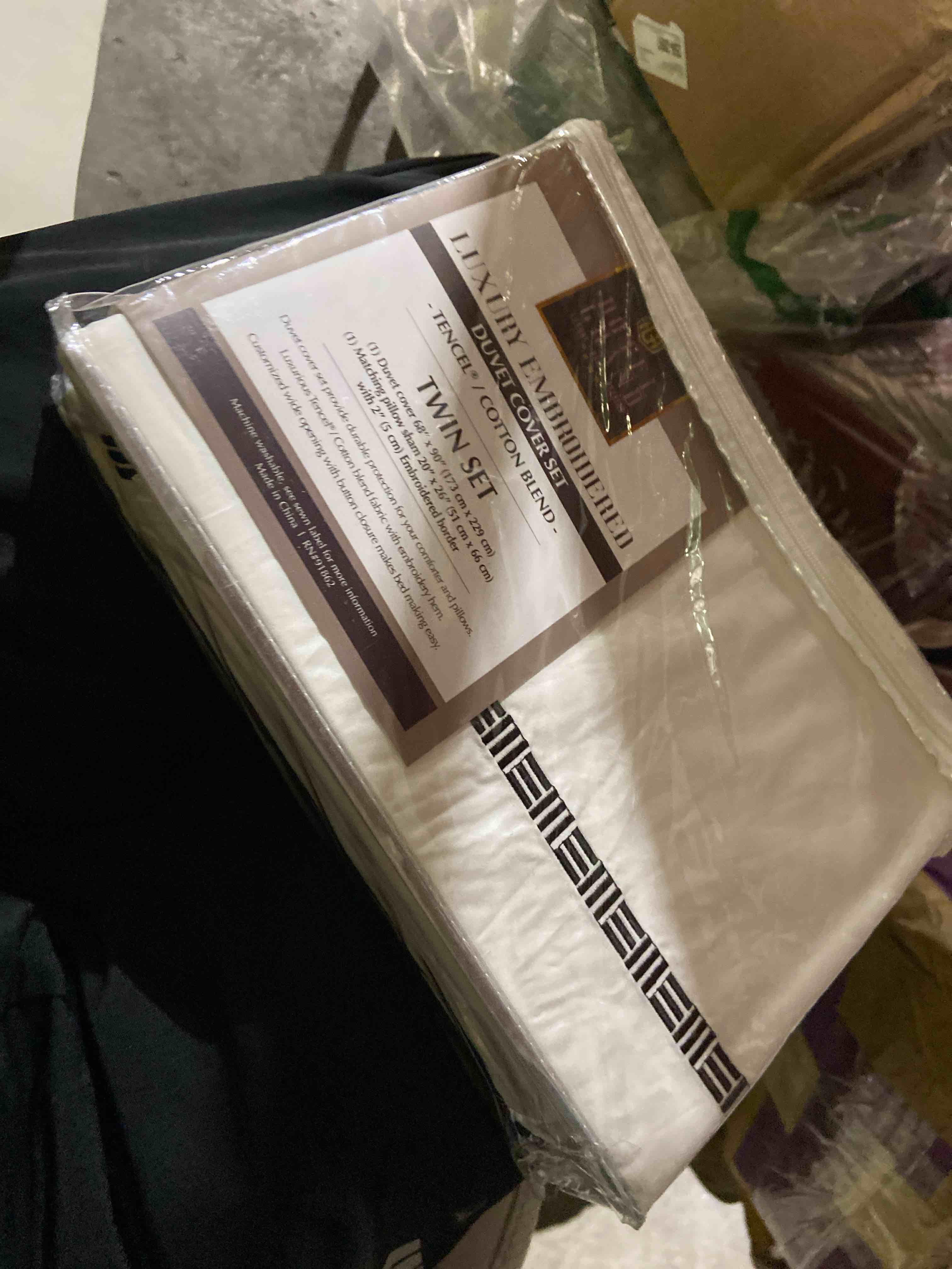 Condition photo showing New/Like New for Hotel Grand Tencel™ Lyocell with Cotton Blend Sheet Set with Colored Embroidery (Queen, Black)