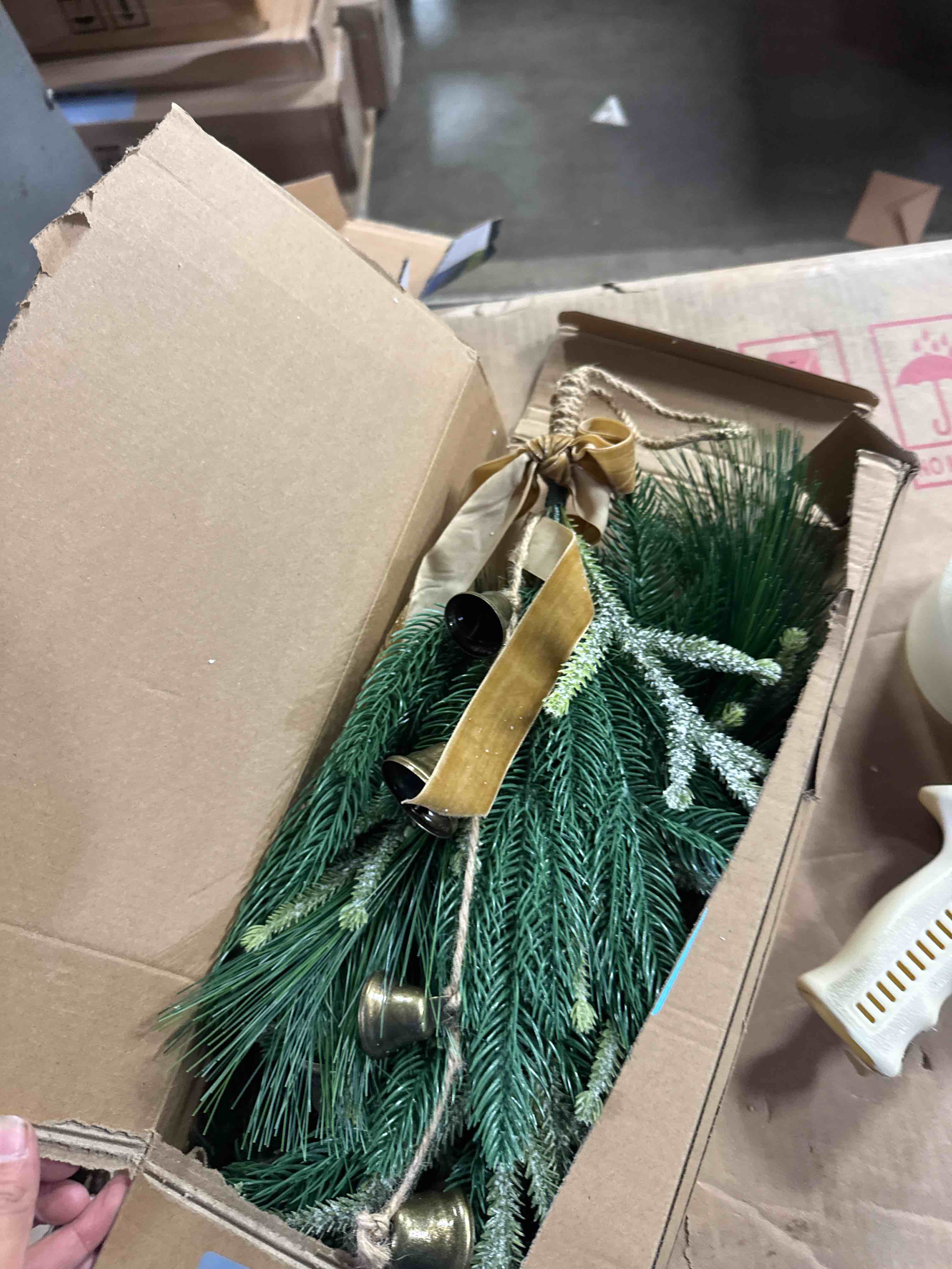 Condition photo showing New/Like New for 2 Pack Christmas Teardrop Swag with Rustic Velvet Ribbon Bow and Bells 24 Inch Artificial Norfolk Pine Needles Greenery Wreath Hanging Decor for Front Door Farmhouse Home Wall Mantle Decor