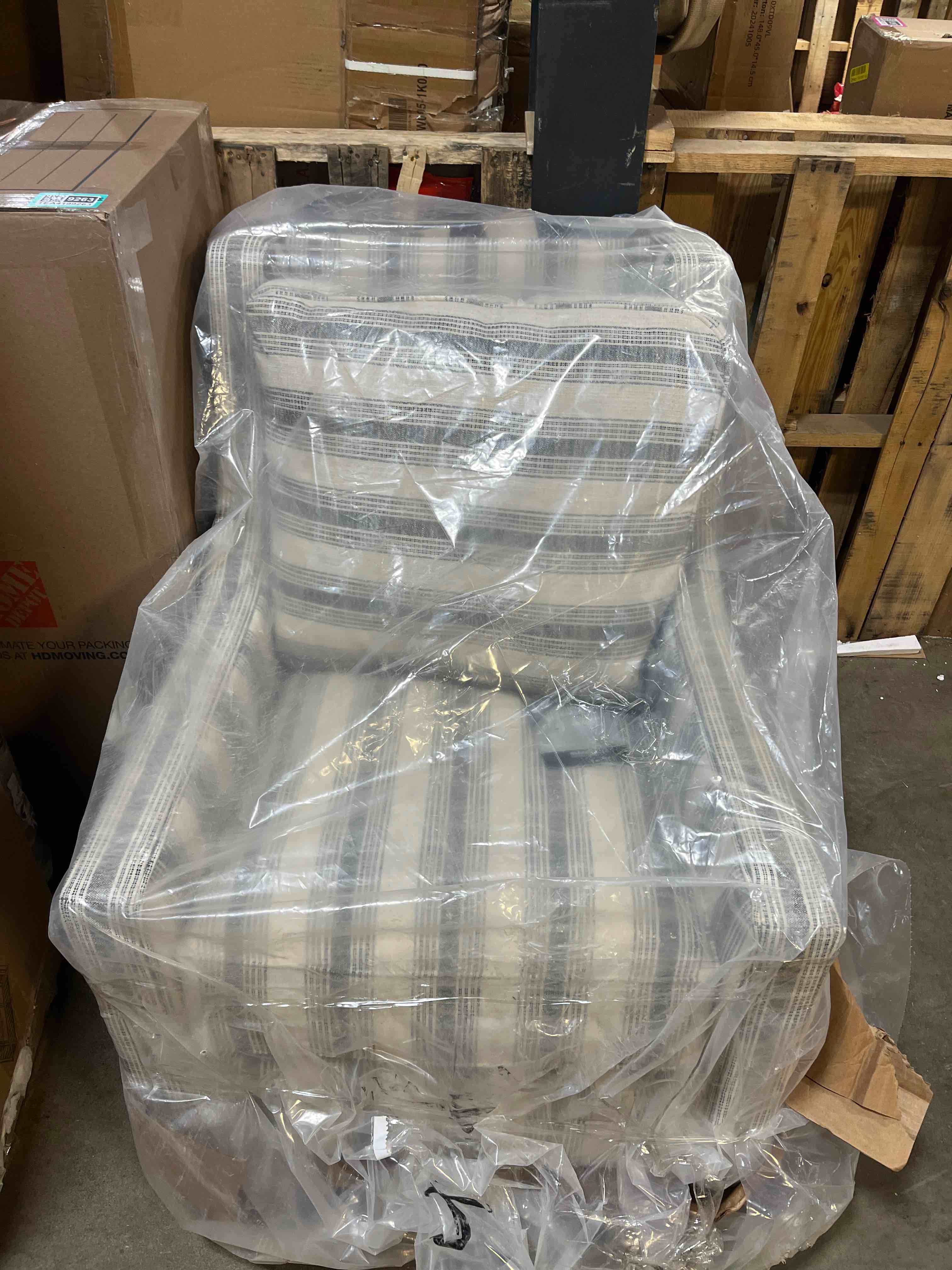 Condition photo showing New/Like New for Signature Design by Ashley Kambria Striped Upholstered Swivel Accent Glider Chair, Ivory & Black