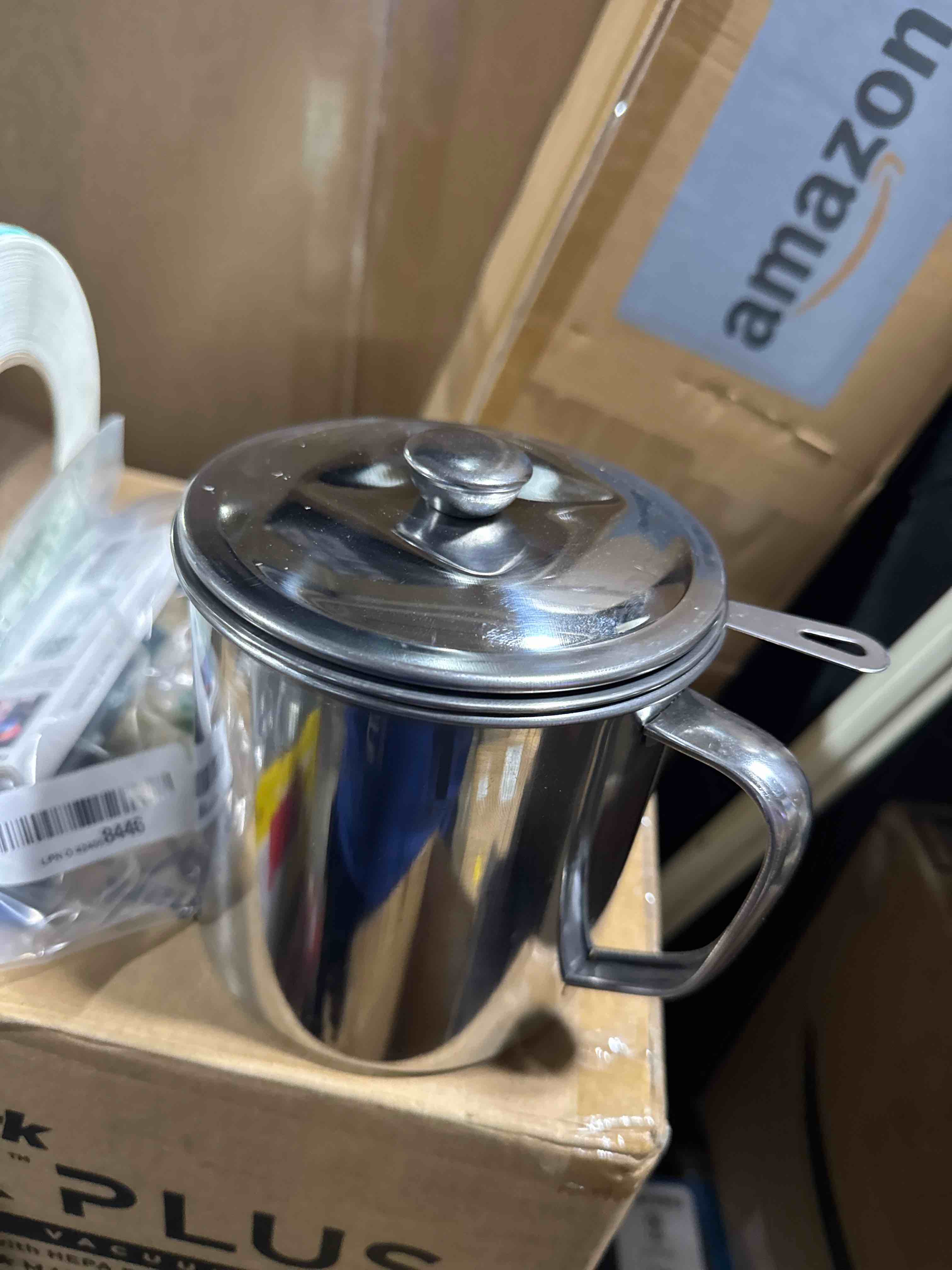 Condition photo showing Good Condition for Kyraton Bacon Grease Container With Strainer, 48 oz Stainless Steel Oil Container, Pot Fat Storage With Lid, Easy Grip Handle Suitable For Storing Frying Oil And Cooking Grease 1. Silver