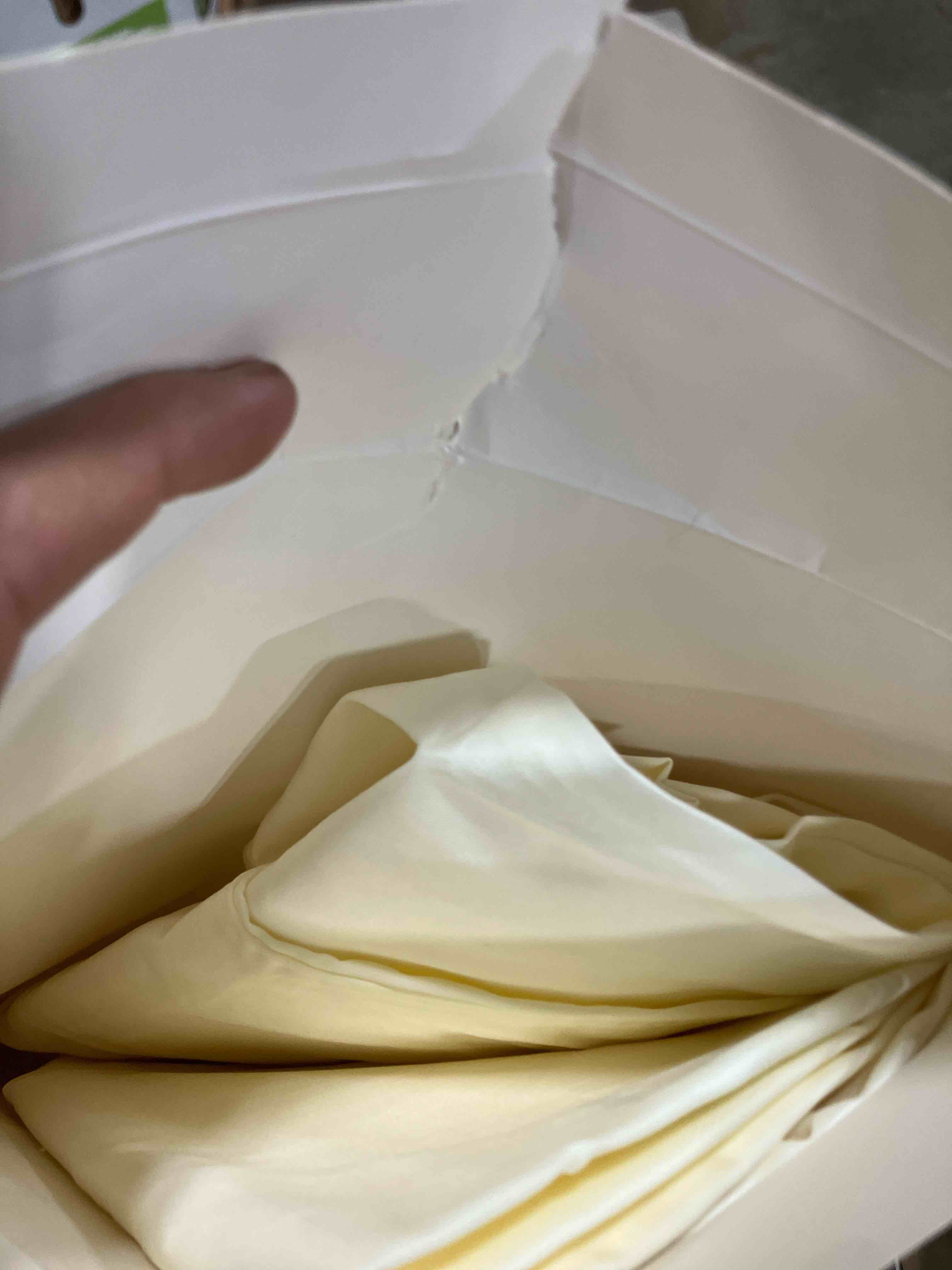 Condition photo showing New/Like New for Bedsure King Size Pillow Cases Set of 2, Cooling Pillow Cases King, Rayon Derived from Bamboo Cream Pillowcases, Breathable & Silky Soft Cool Bedding Pillow Covers with Envelope Closure, 20x36 Inches 06 - Cream King (20" x 36")