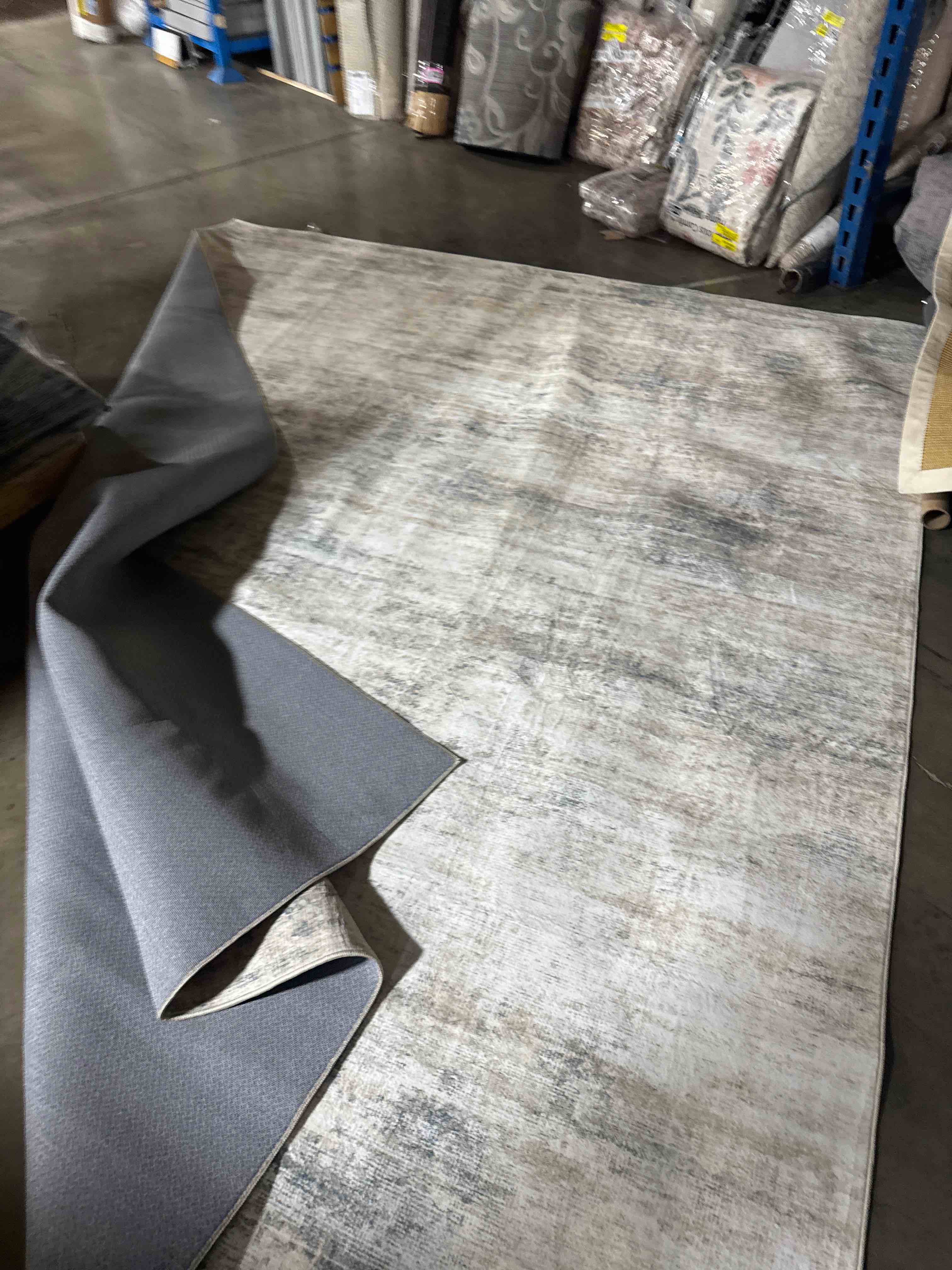 Condition photo showing Good Condition for Abstract Hand Tufted Wool Area Rug ( 9'11" x 7'11")