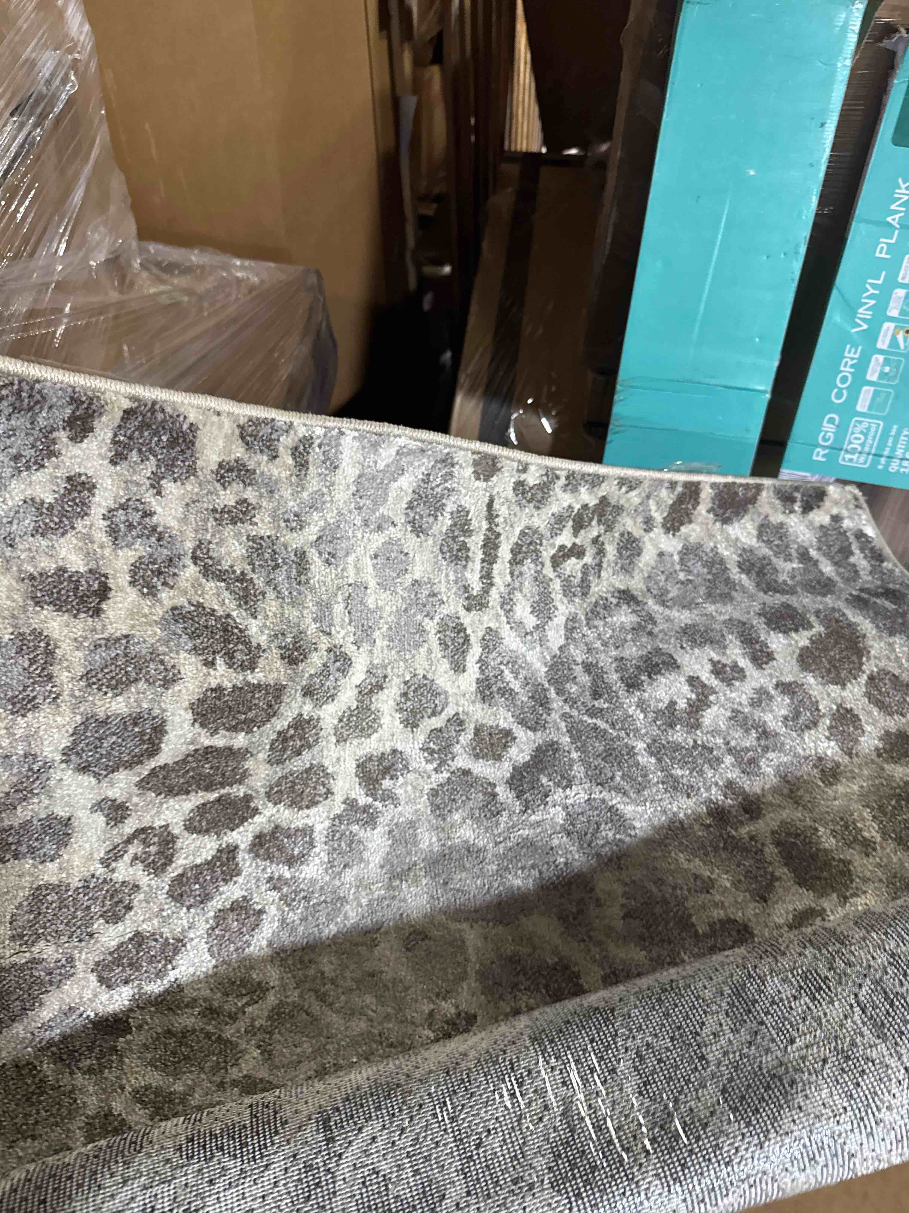 Condition photo showing New/Like New for Loomaknoti Mendez Marleene 3  x 5  Gray Animal Print Indoor Accent Rug