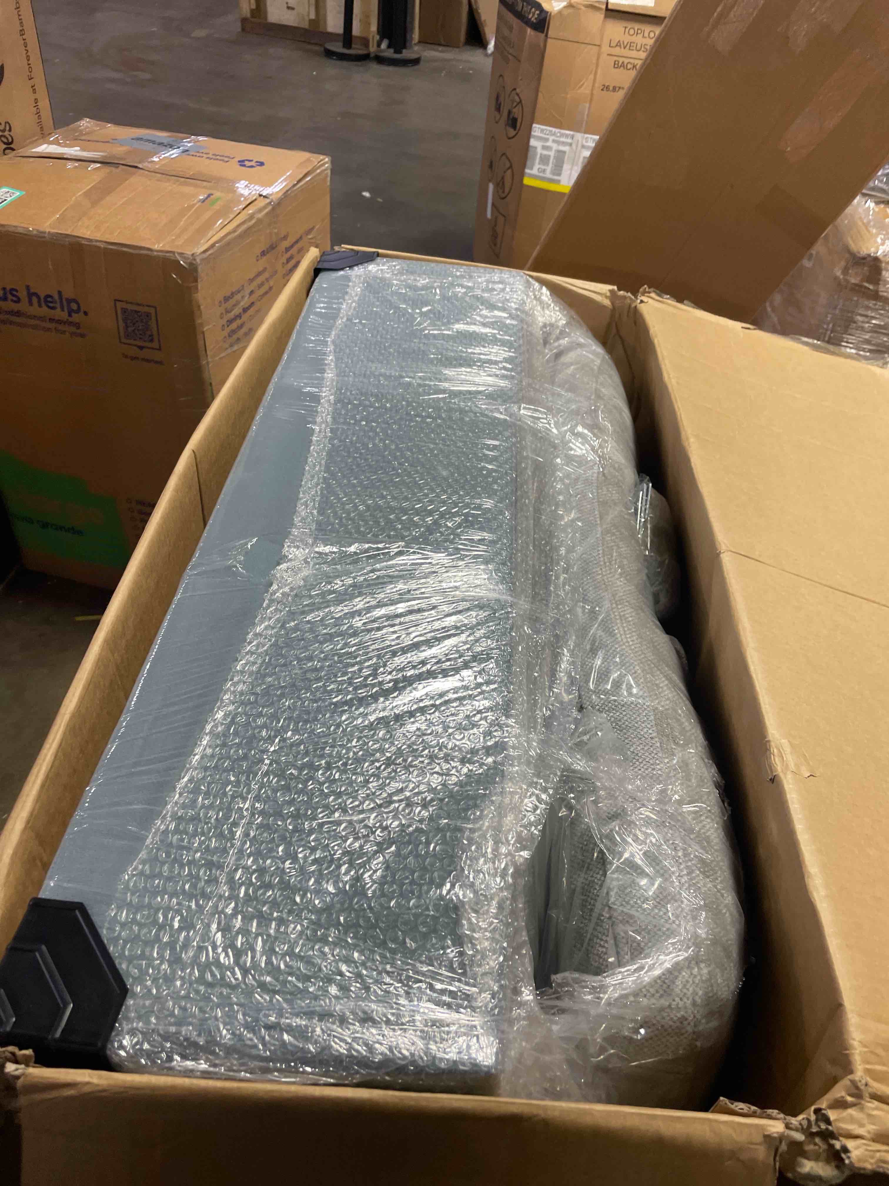Condition photo showing Good Condition for 119 in. square arm linen oversized 4-piece l-shaped modular sectional sofa with ottoman in. gray ( similar to one in stock, incomplete 3 boxes only)