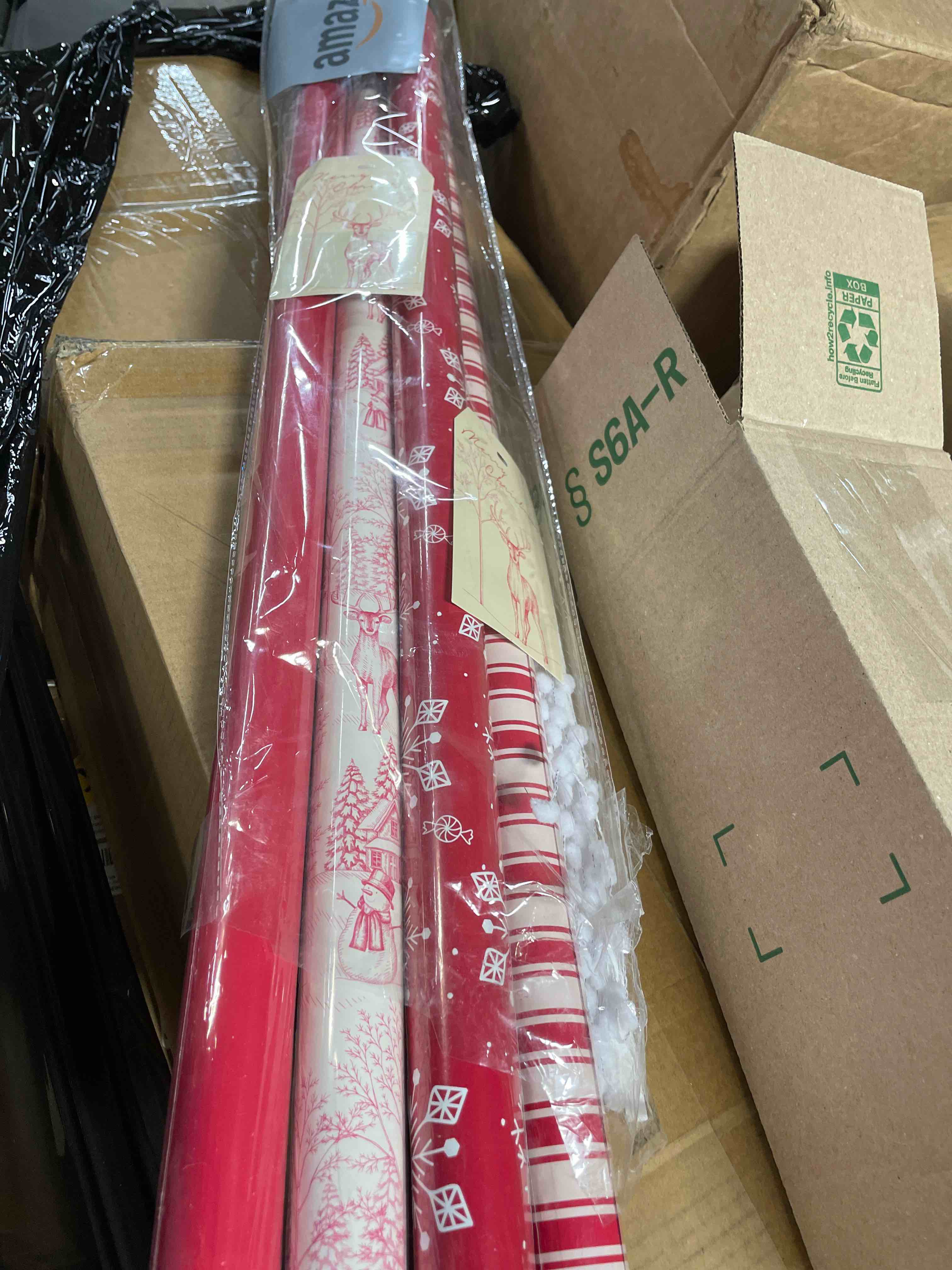 Condition photo showing New/Like New for RUSPEPA Christmas Kraft Wrapping Paper - Reindeer, Berry Leaf and Text Design - 4 Rolls - 30 inches x 10 feet per Roll