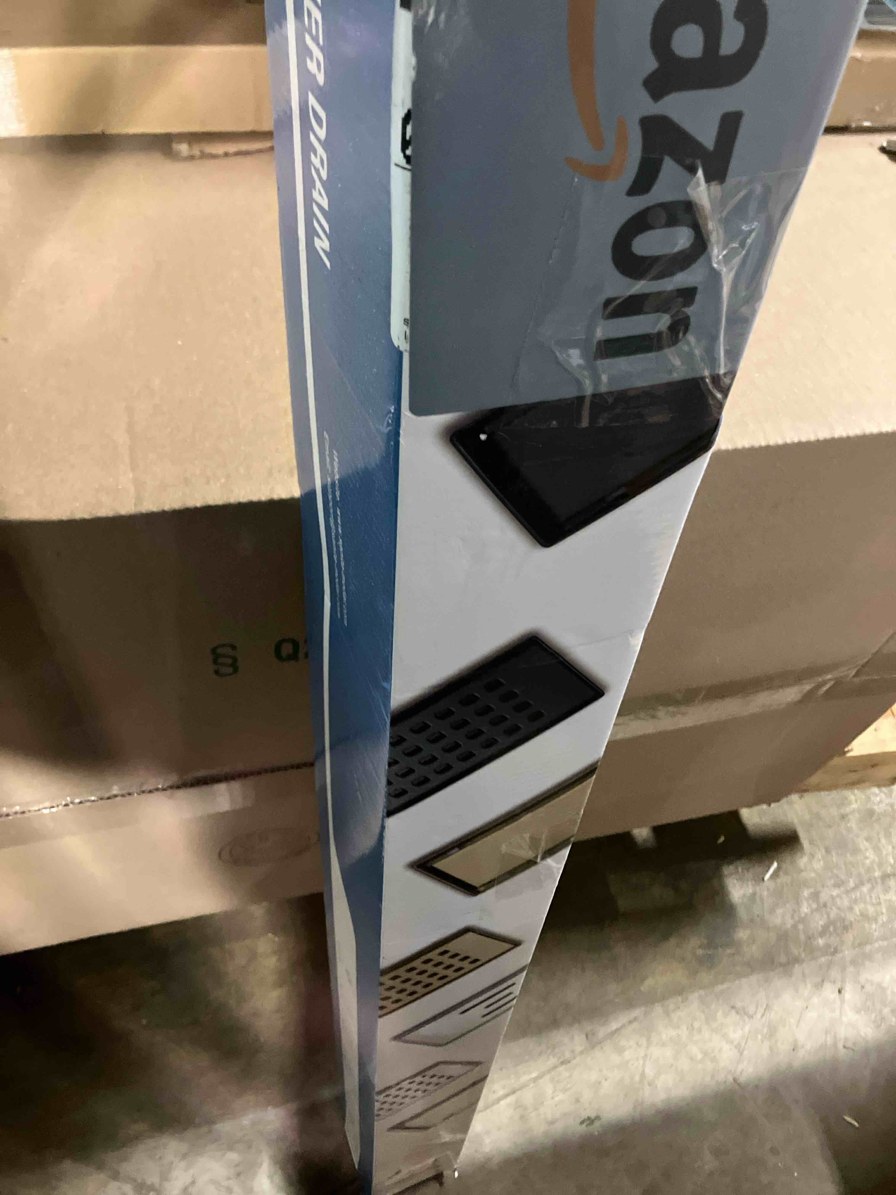 Condition photo showing New/Like New for SaniteModar Linear Shower Drain, Shower Drain Gold 48 inch with Removable Grate,Brushed 304 Stainless Steel Gold Shower Floor Drain Include Hair Strainer,Adjustable Leveling Feet