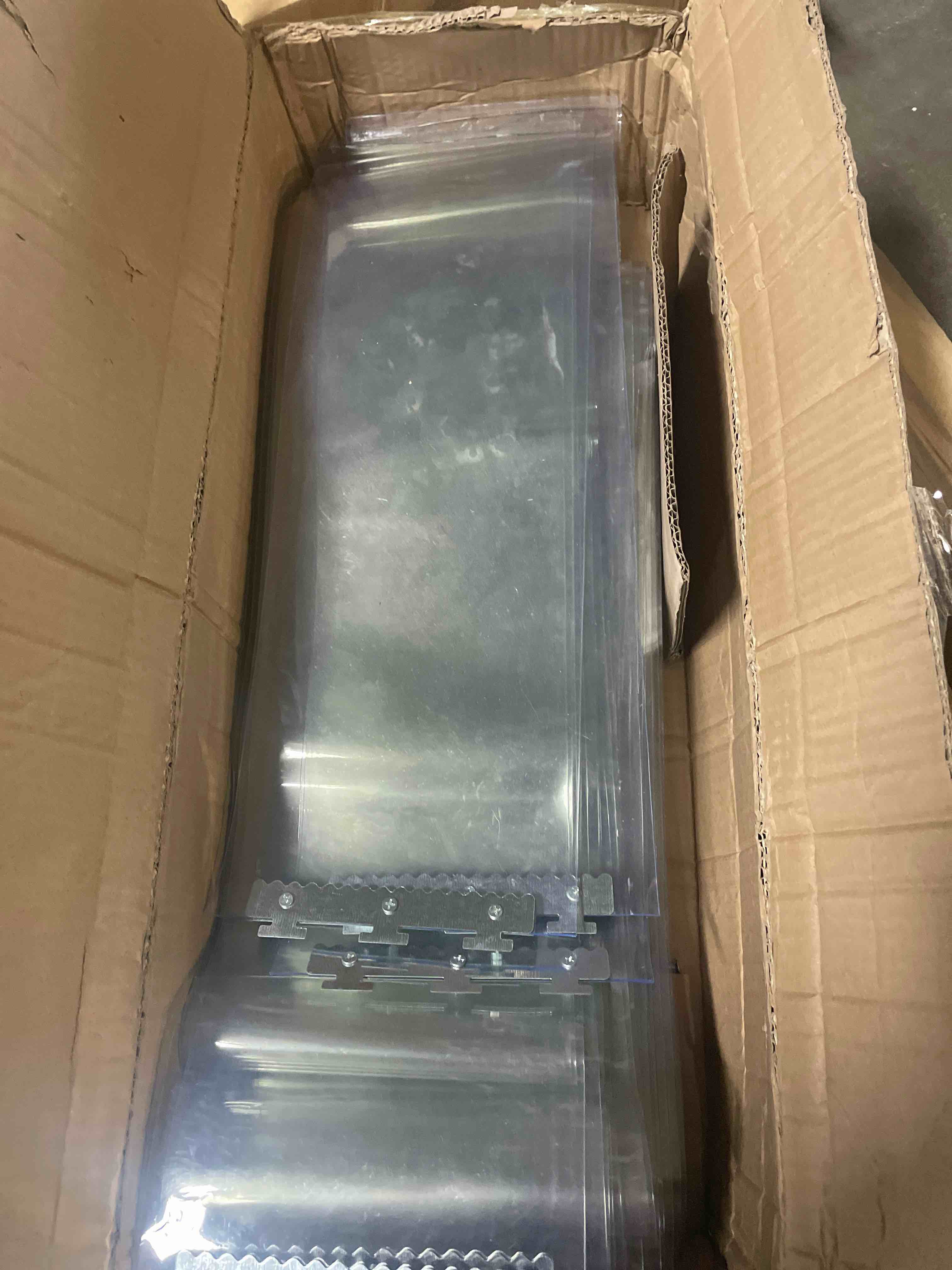 Condition photo showing Good Condition for Strip Door Curtain Kit - 96 in.(8 ft) Width X 96 in.(8 ft) Height - Clear Smooth 8" Wide x .08 in. Thick PVC Strip 50% Overlap - Complete Plastic Strip Door Kit - Universal Hanger