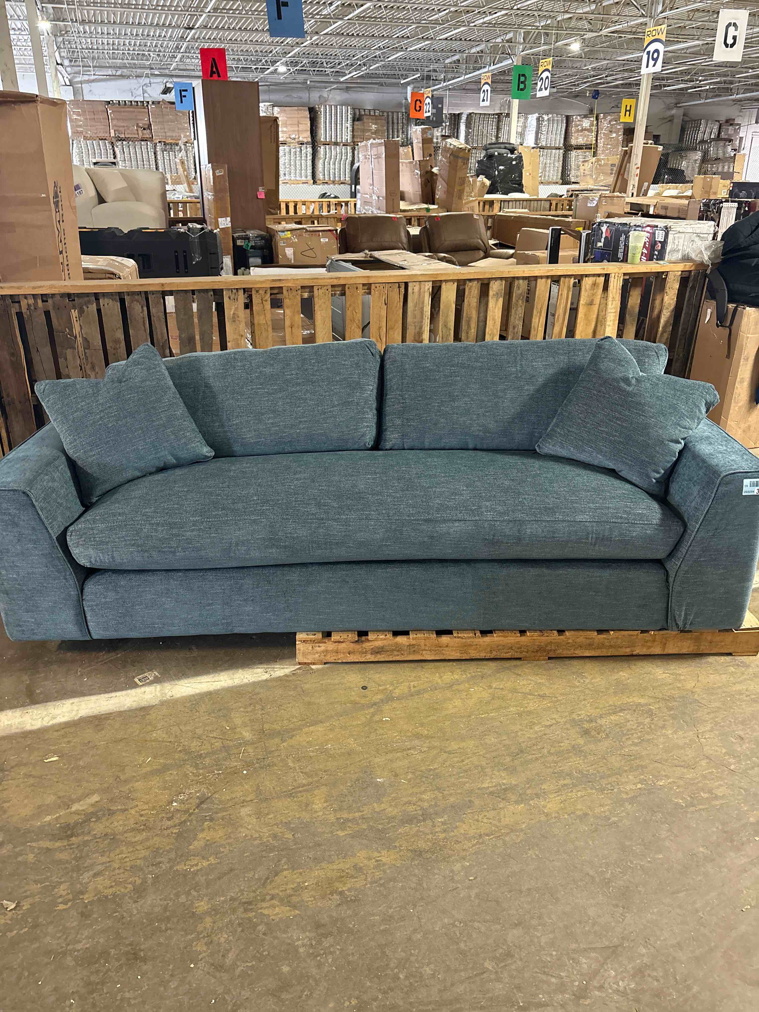 Condition photo showing Good Condition for Benehaley 100" Ink Blue Polyester 3-4 Seat Square Arm Sofa with Reversible Cushions (Small tear on the side of the couch, the bottom of the couch needs repairing, but nothing a staple gun can’t fix) 34'' H X 100'' W X 40.5'' D