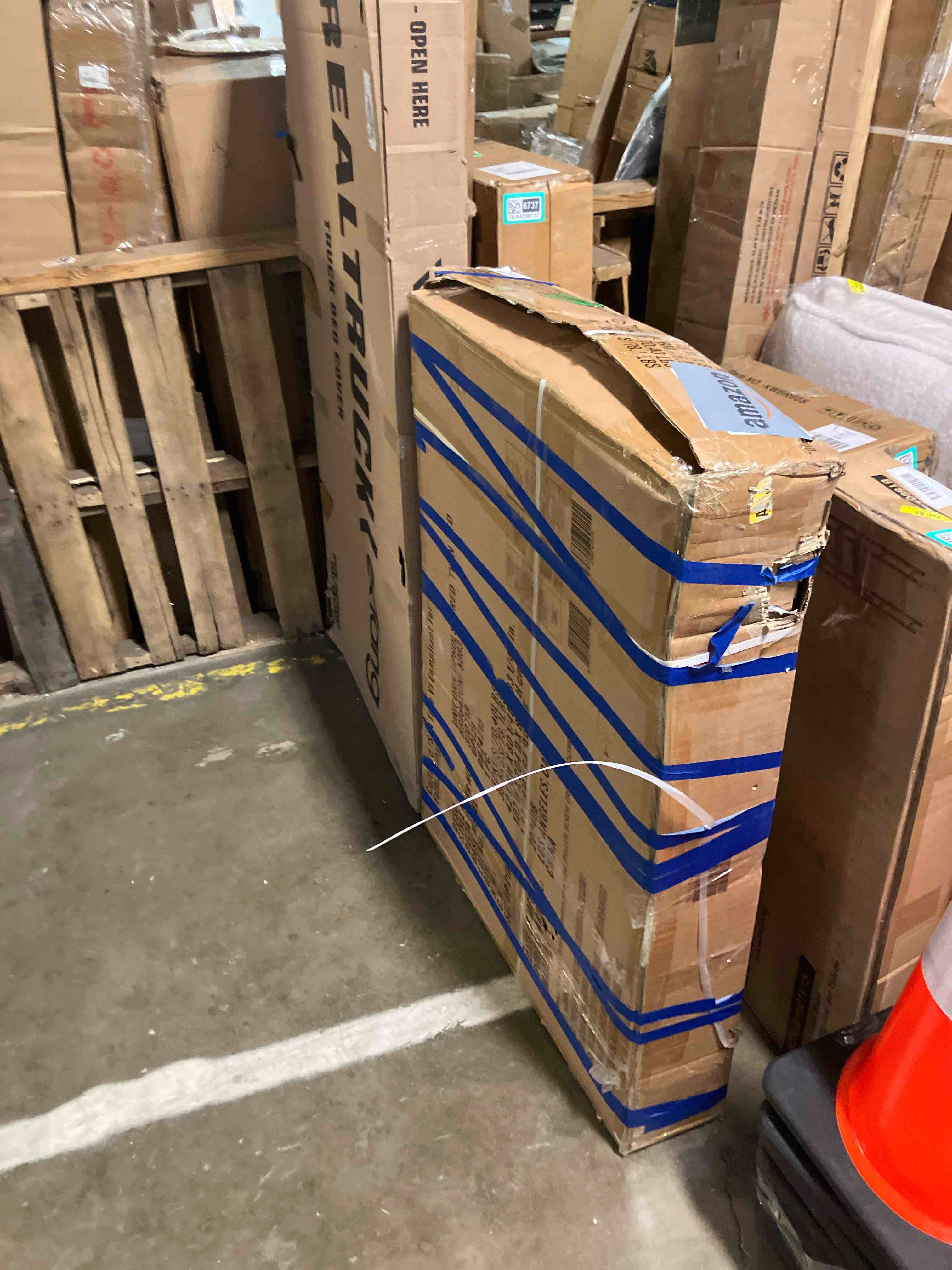 Condition photo showing As Is for Warehouse Delta Children Jeep Upholstered Twin Bed (Missing hardware)