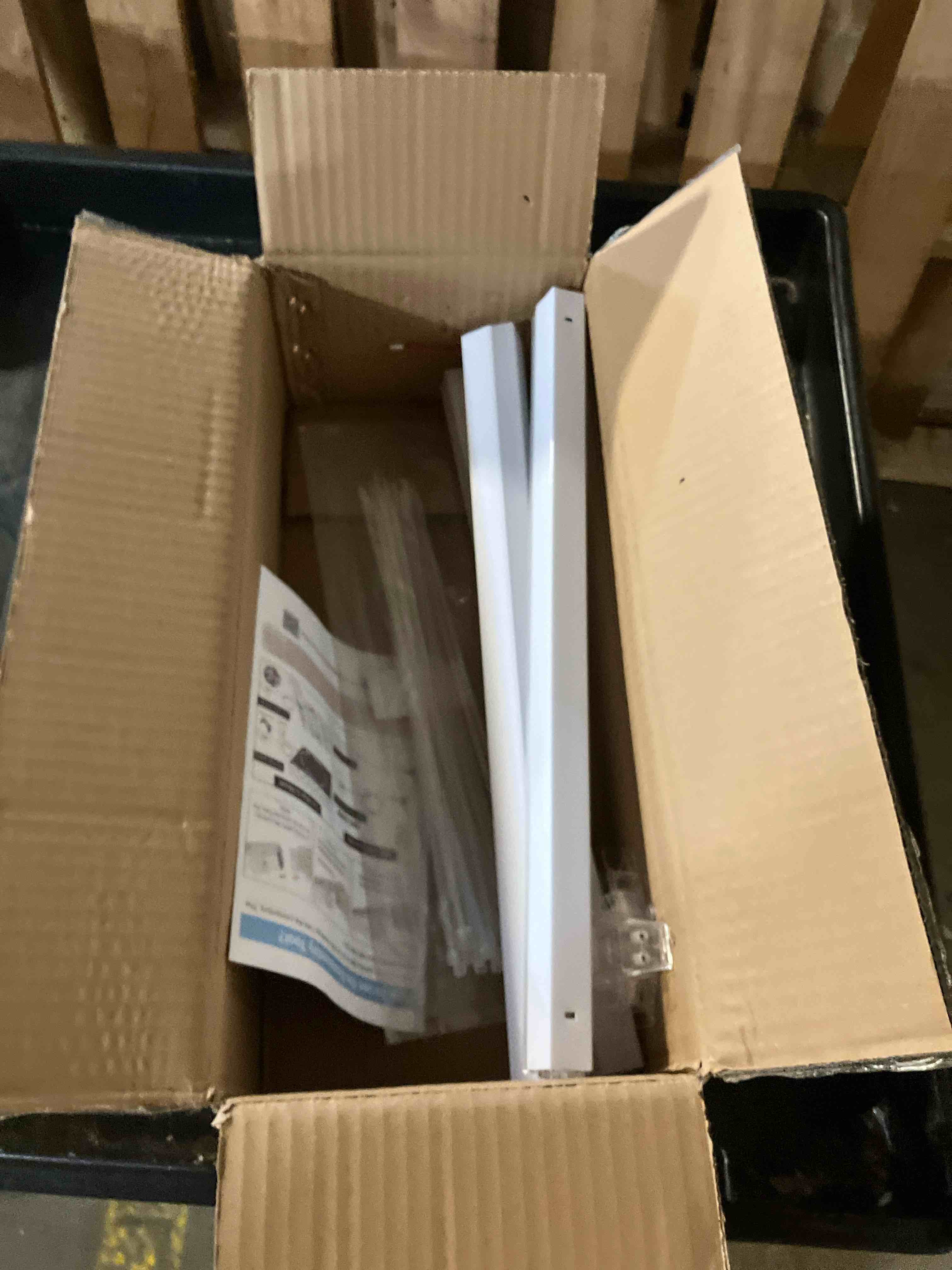 Condition photo showing As Is for STAS Cliprail Picture Hanging System Set - Covers 19.69 ft of Wall Space - Basic Picture Rail & Art Hanging Gallery Kit (Matte Silver Rails, Includes 12 Hooks & 8 Cords)