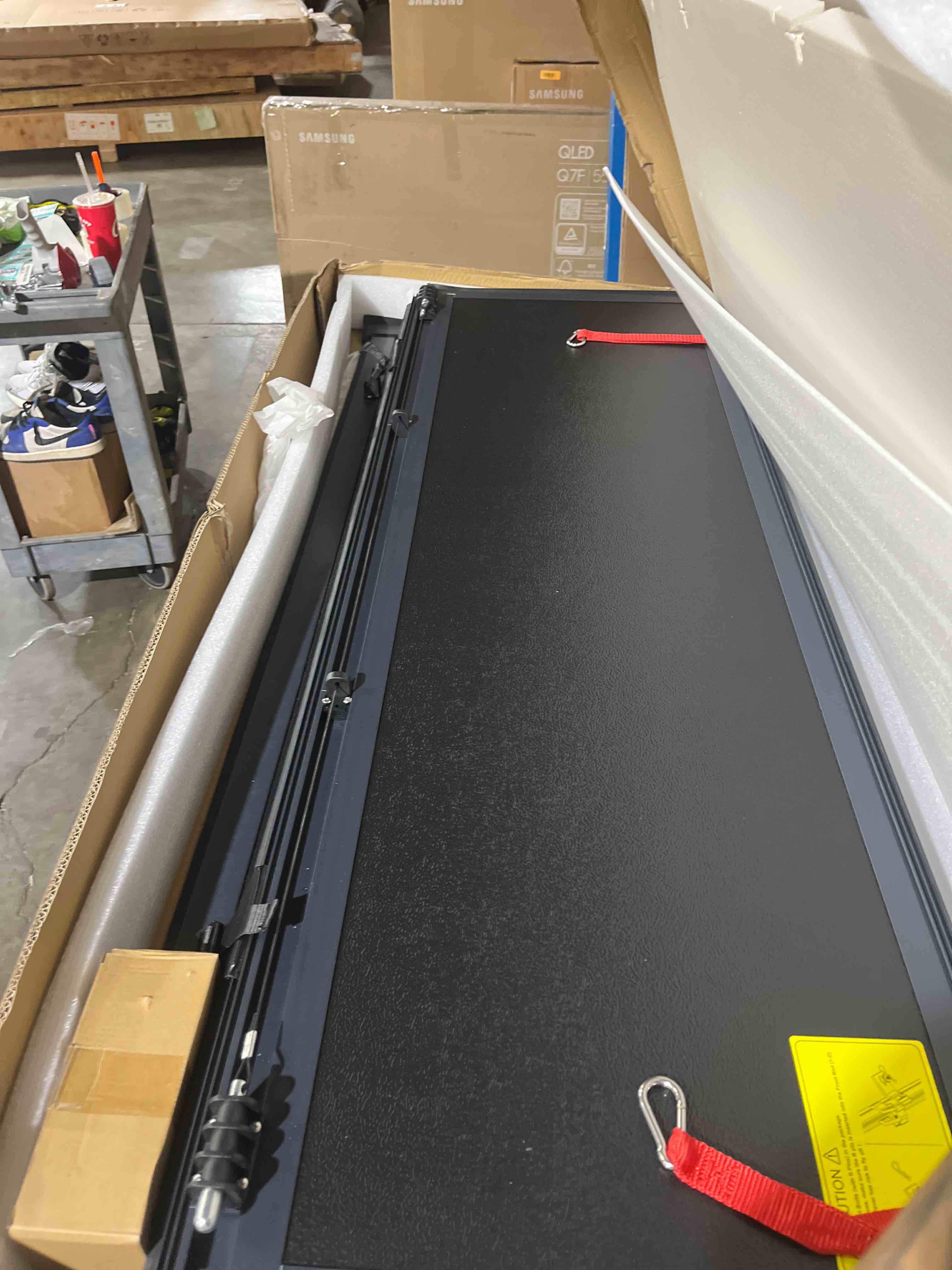 Condition photo showing New/Like New for rough country hard tri-fold tonneau cover for toyota tundra (2022-2025) - low-profile aluminum truck bed cover, fits 5'7 bed w/cargo mgmt
