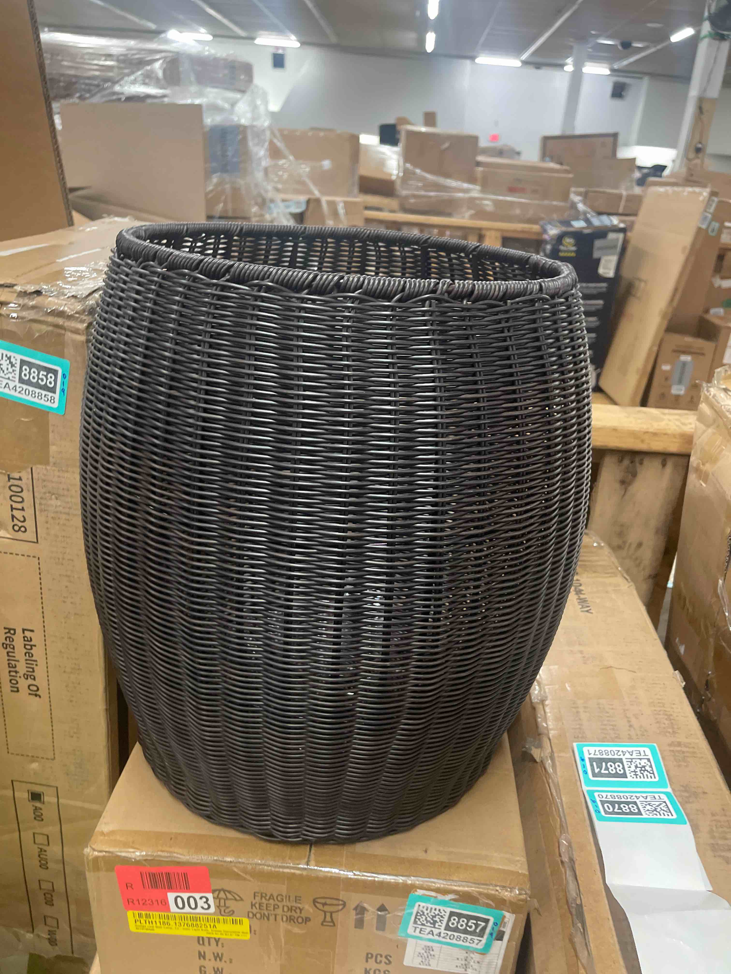 Condition photo showing New/Like New for handwoven resin barrel side table, brown