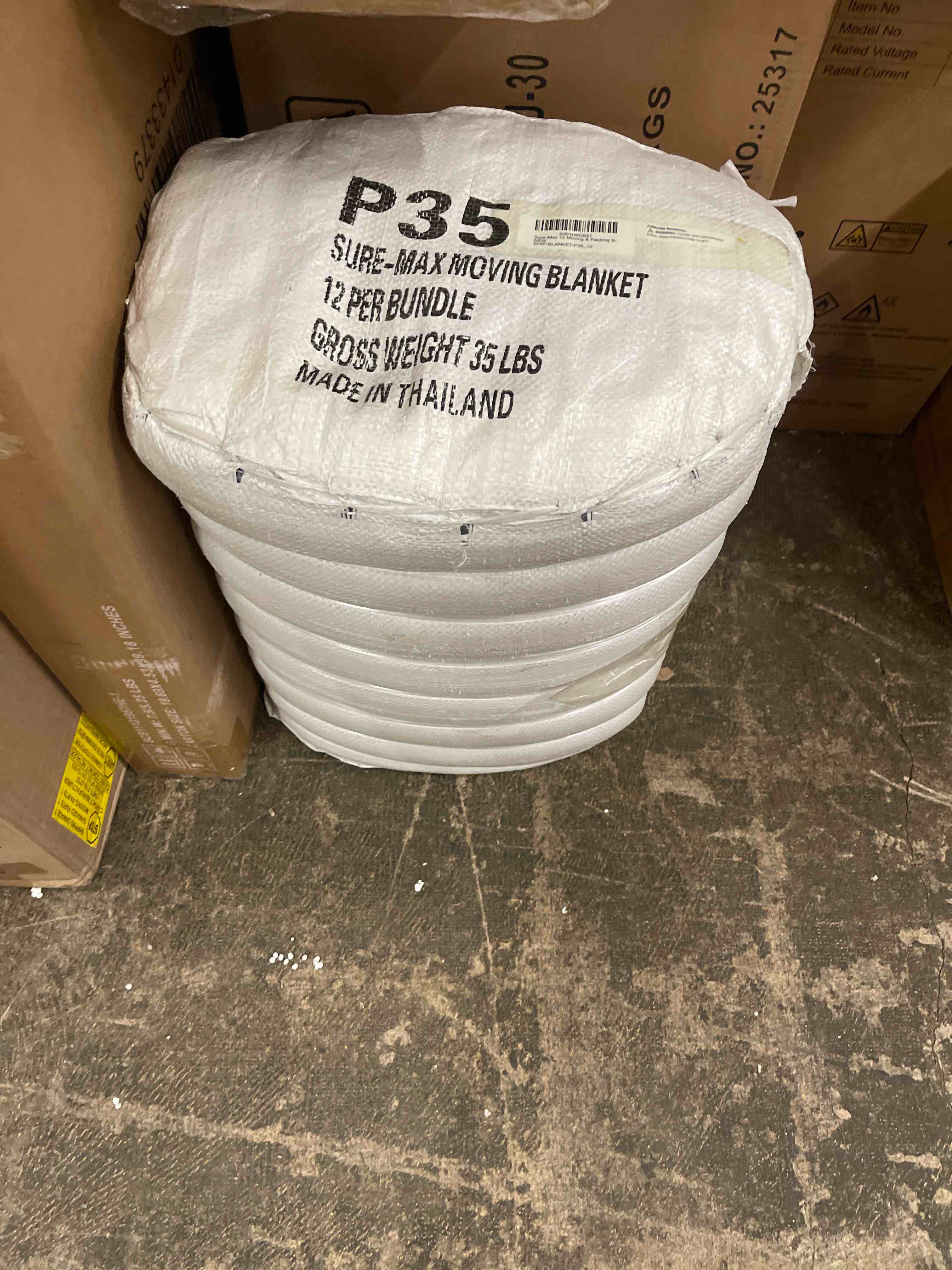 Condition photo showing New/Like New for 12 moving & packing blankets - pro economy - 80" x 72" (35 lb/dz weight) - quilted shipping furniture pads navy blue and black