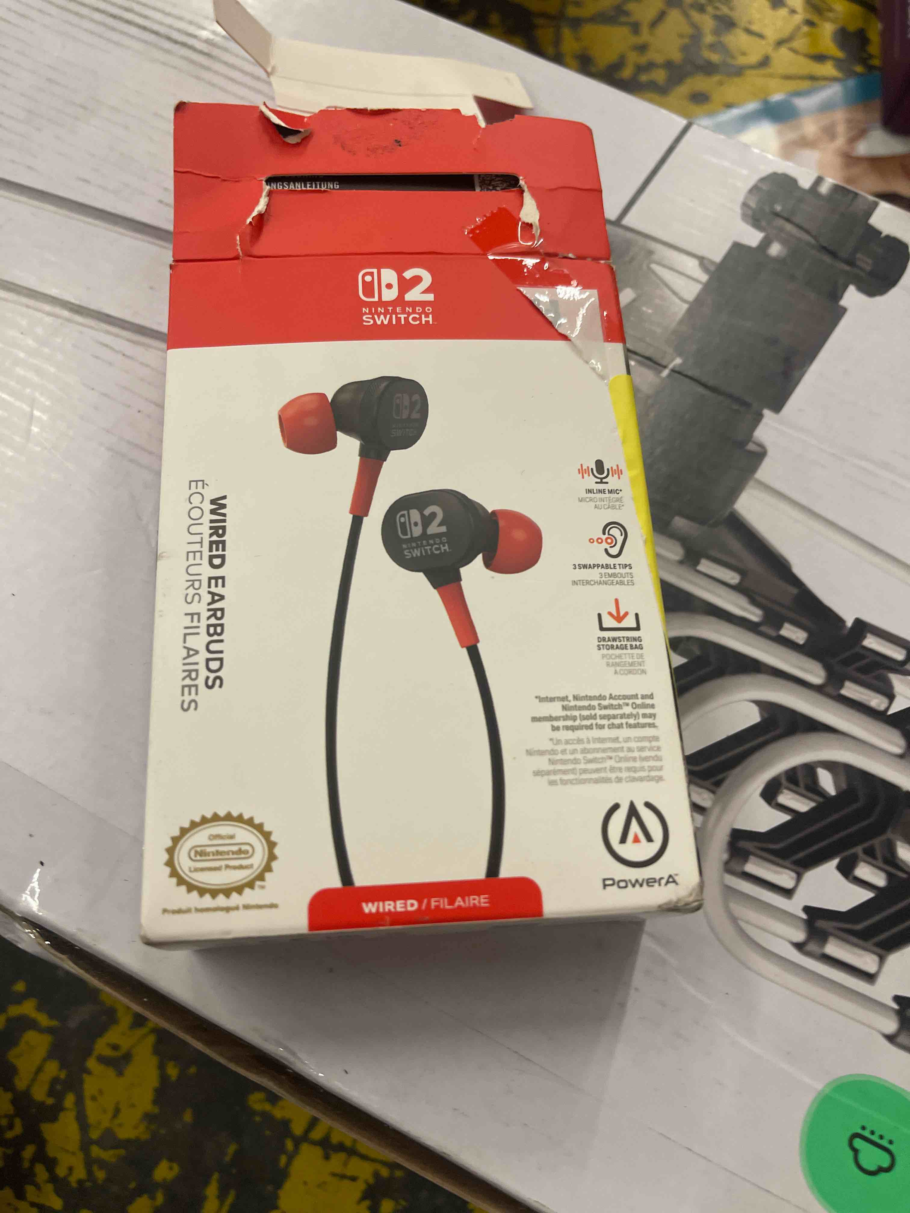 Condition photo showing New/Like New for powera wired earbuds for nintendo switch 2- black