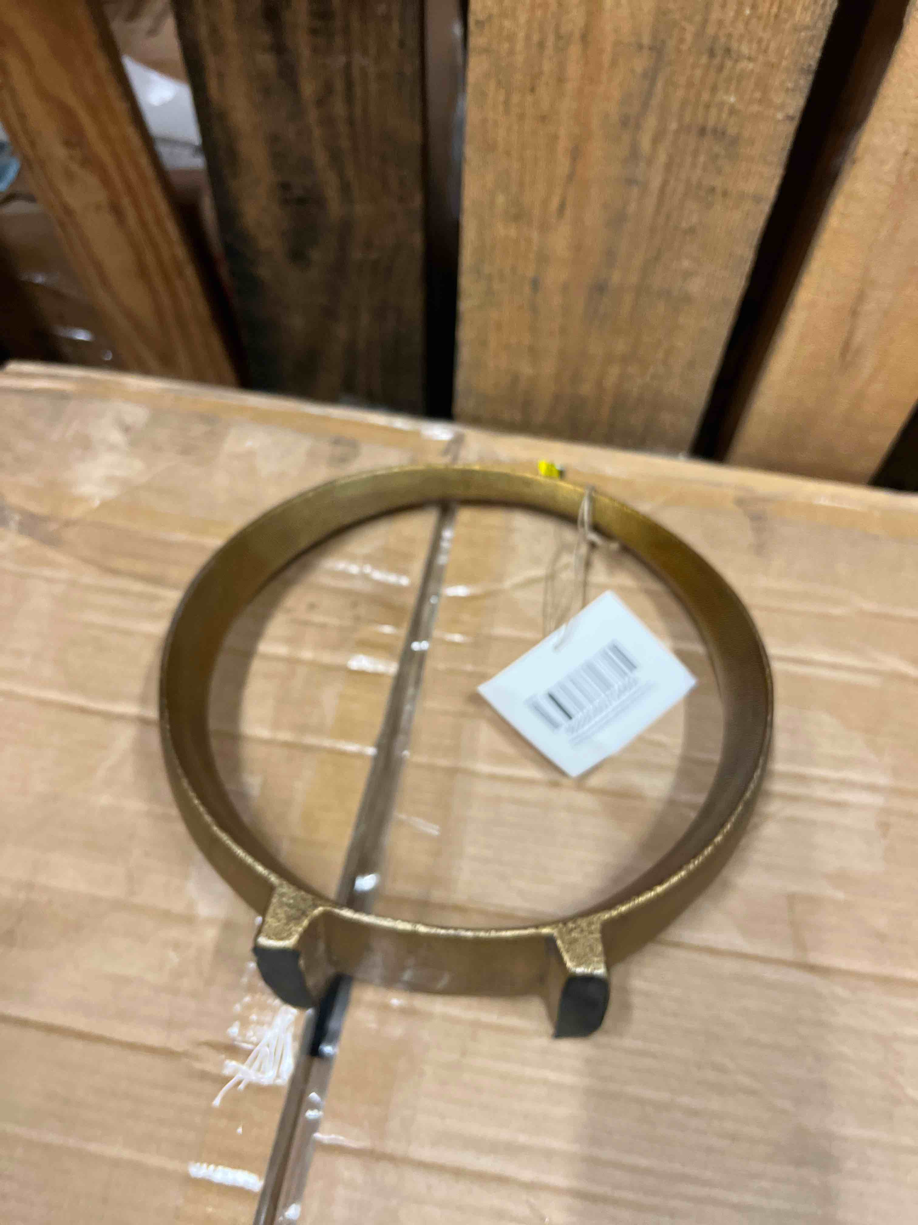Condition photo showing New/Like New for signature design by ashley contemporary ryandale sculpture antique brass finish