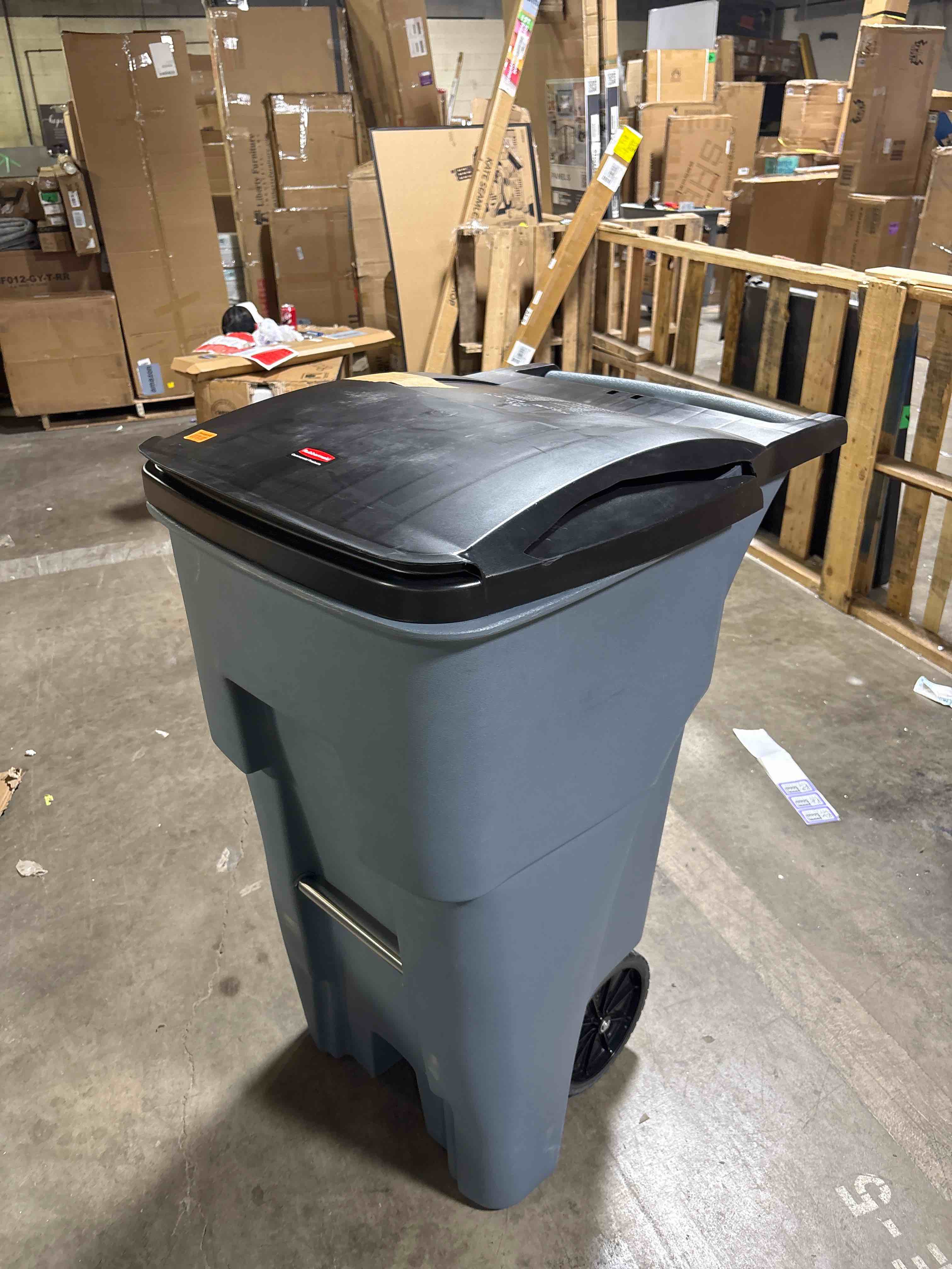 Condition photo showing Good Condition for Rubbermaid Commercial Products BRUTE Rollout Plastic Trash/Garbage Can/Bin with Wheels 65 Gal for Restaurants/Hospitals/Offices/Back of House/Warehouses/Home 65G Gray 1