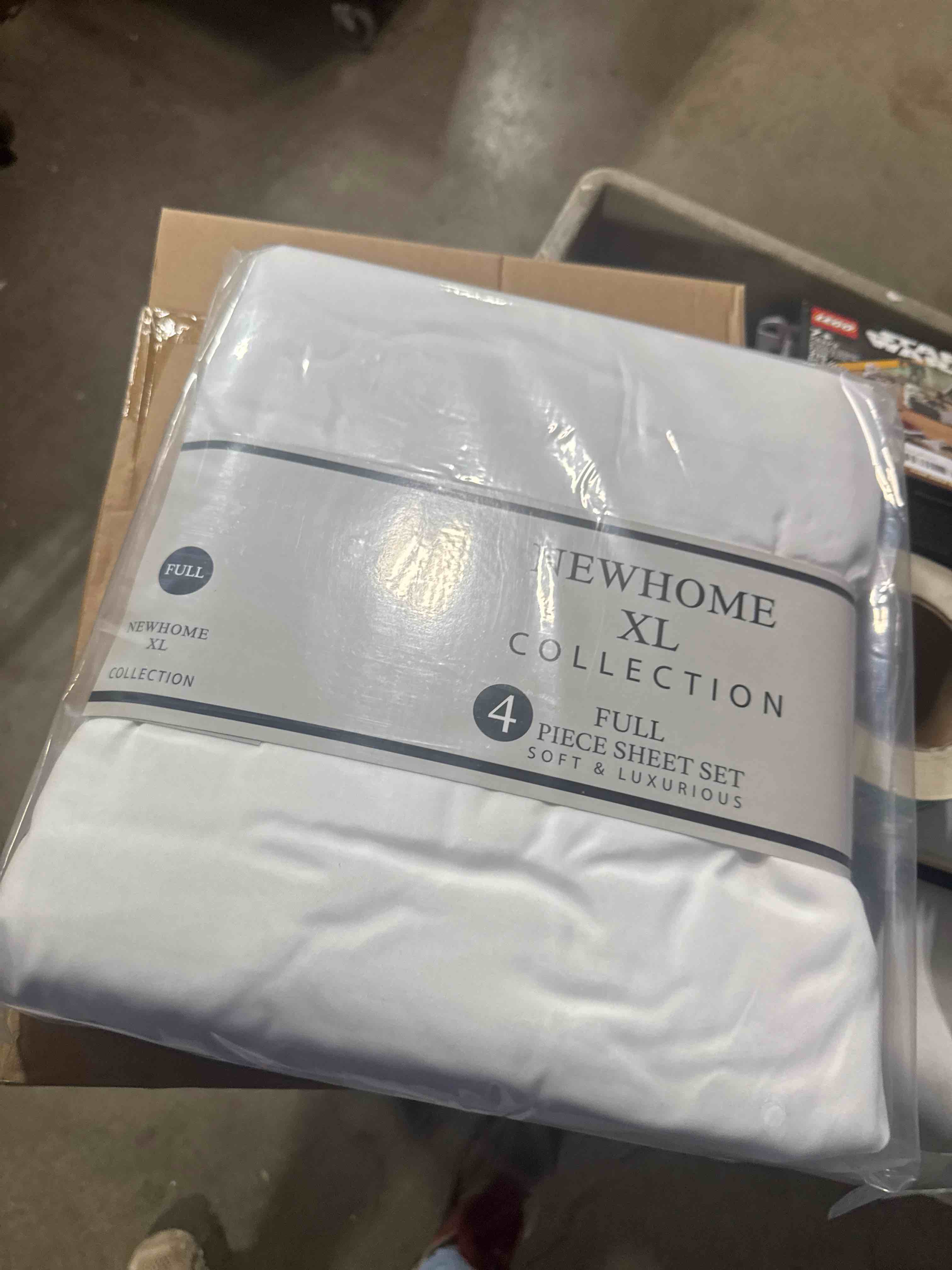 Condition photo showing New/Like New for new home xl collection 4 piece full sheet set