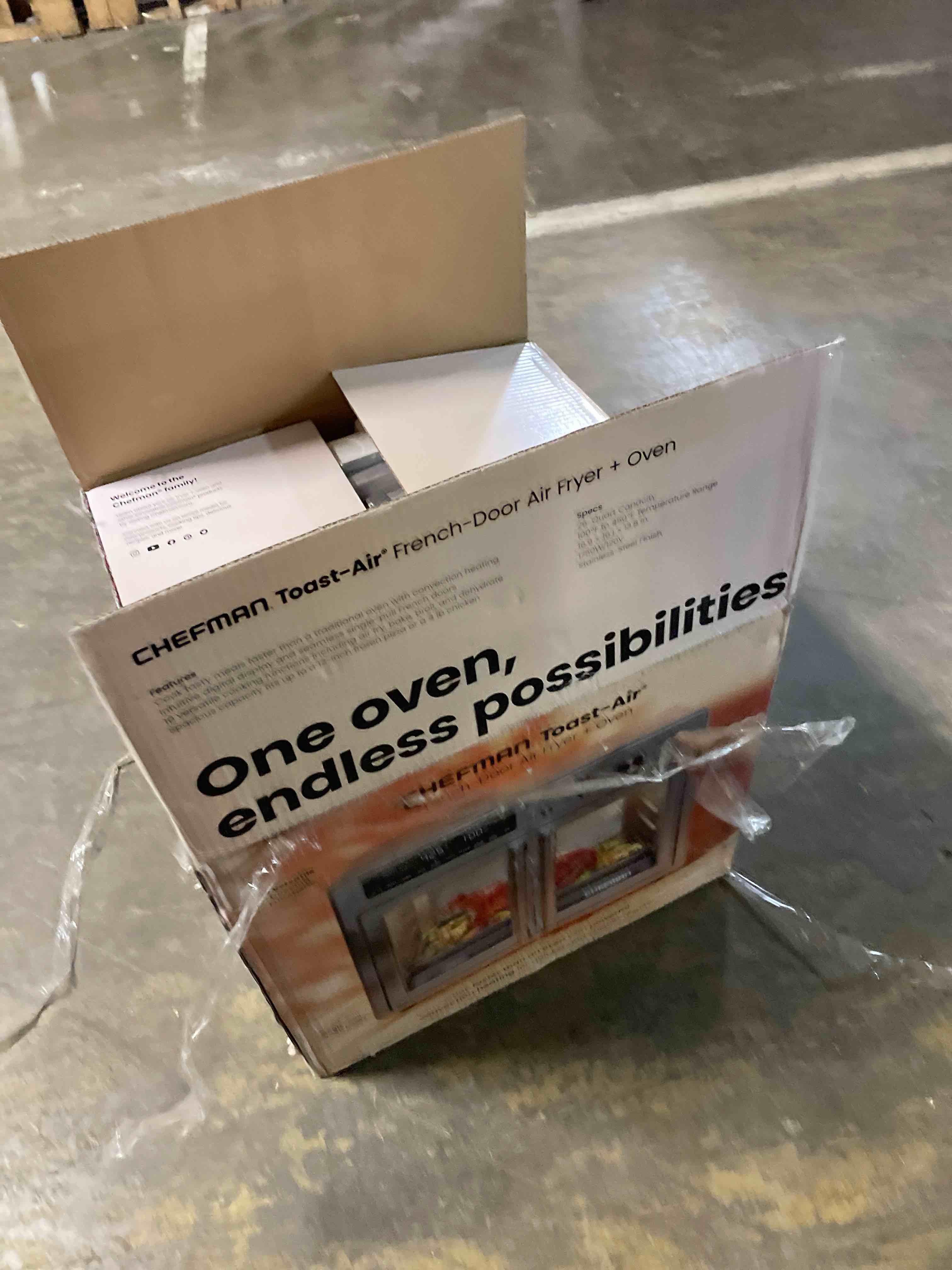 Condition photo showing New/Like New for Dan - Emeril Lagasse Extra Large French Door Air Fryer Toaster Oven Combo, 24 Cooking Functions and Digital Controls, 7 Accessories Included, Stainless Steel Finish, 26QT Capacity