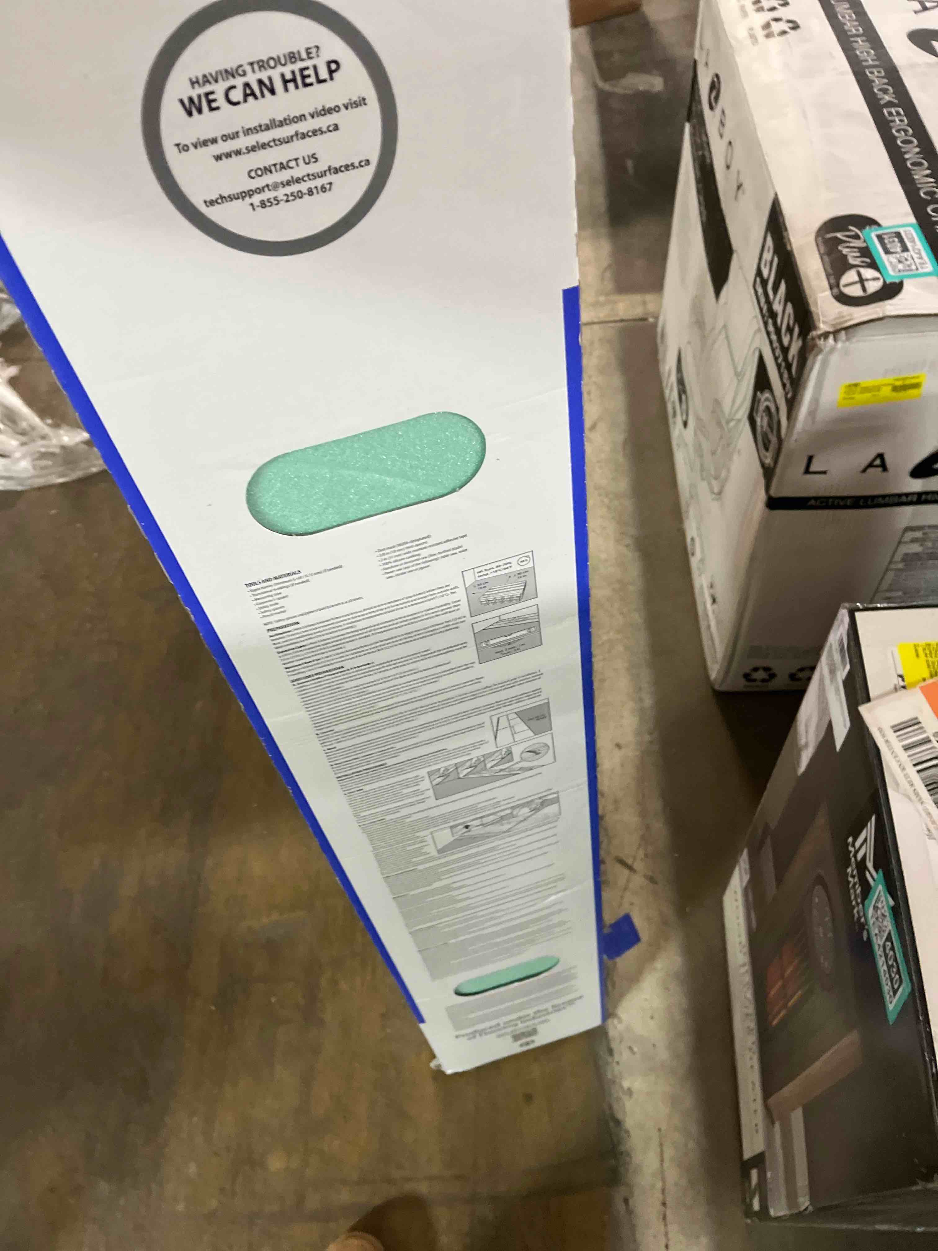 Condition photo showing New/Like New for Select Surfaces SCCOM0501 Victoria SpillDefense Laminate Flooring 17.49 sq. ft. per box