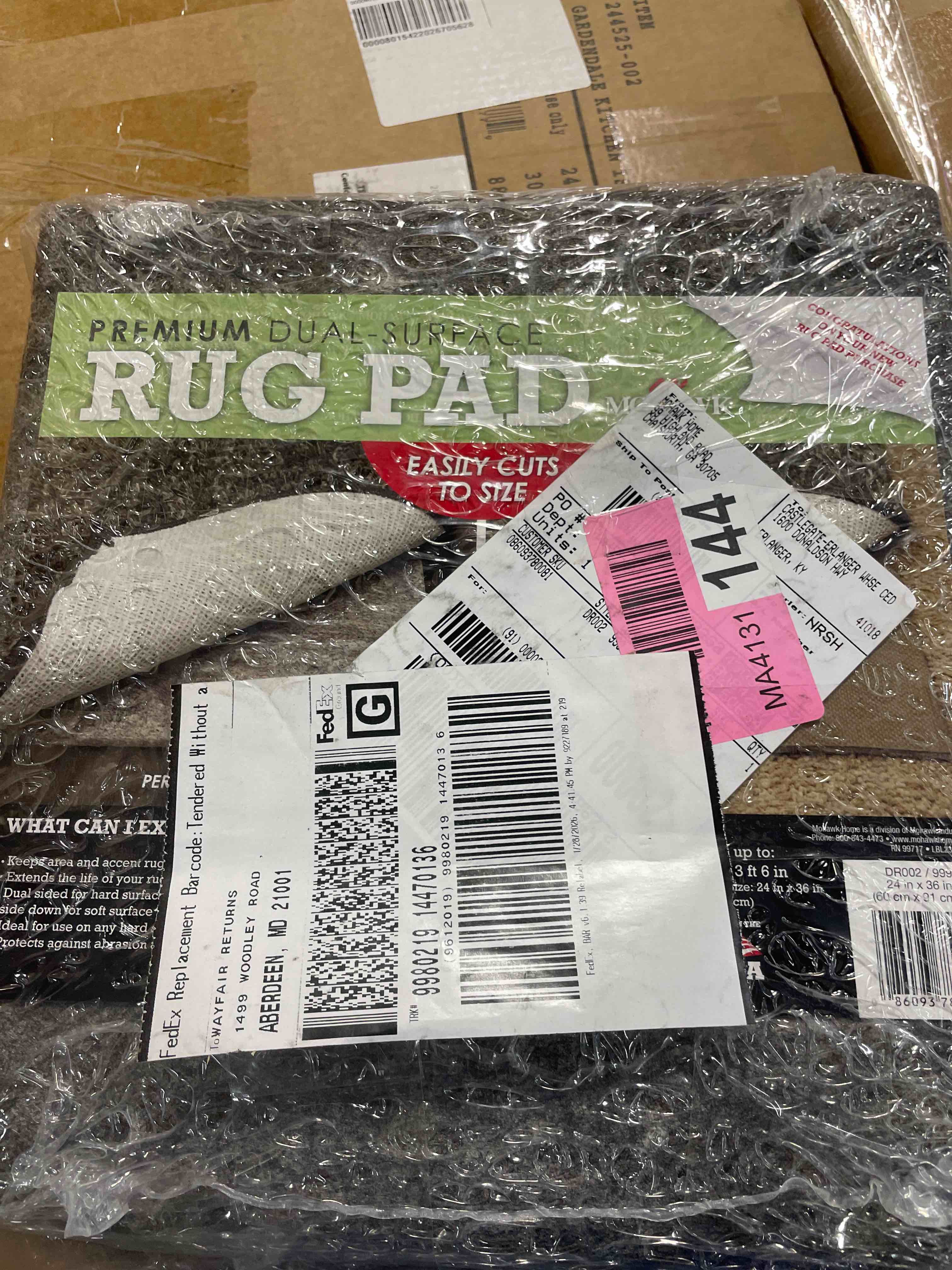 Condition photo showing New/Like New for premium dual surface rug pad