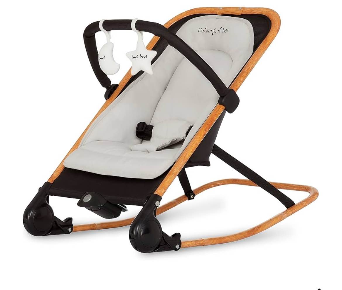 dream on me rock on me 2-in-1 baby rocker and stationary seat, adjustable recline, gentle music & vibration, 3-point safety harness, detachable toy bar, folds compact for travel – black & grey