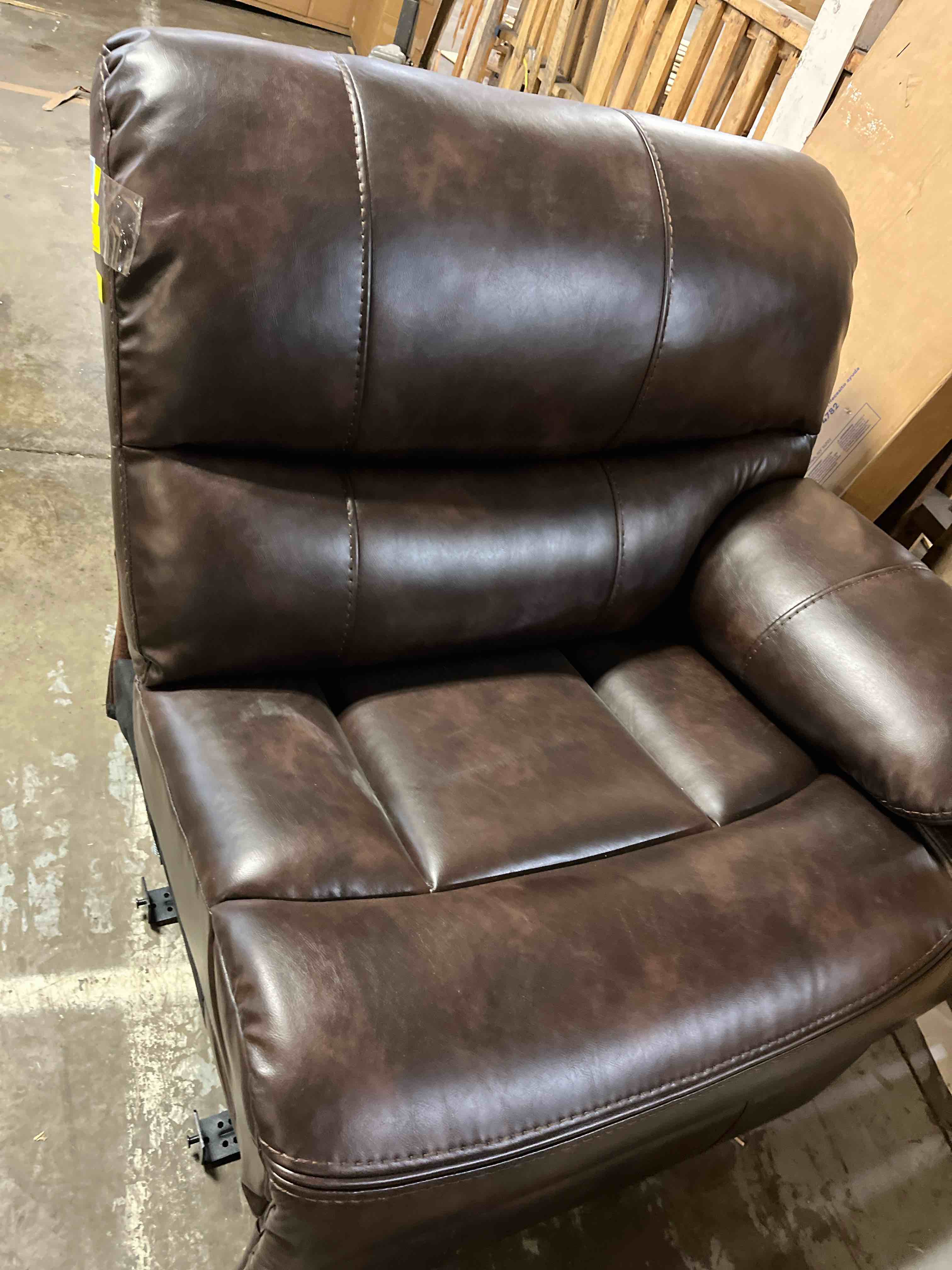 Condition photo showing As Is for EBELLO Faux Leather Manual Recliner Chair, Americana Minimalist Single Reclining Sofa Chair with Footrest, Padded Headrest & Armrests Premium Furniture for Living Room, Bedroom, Brown(Missing right arm )