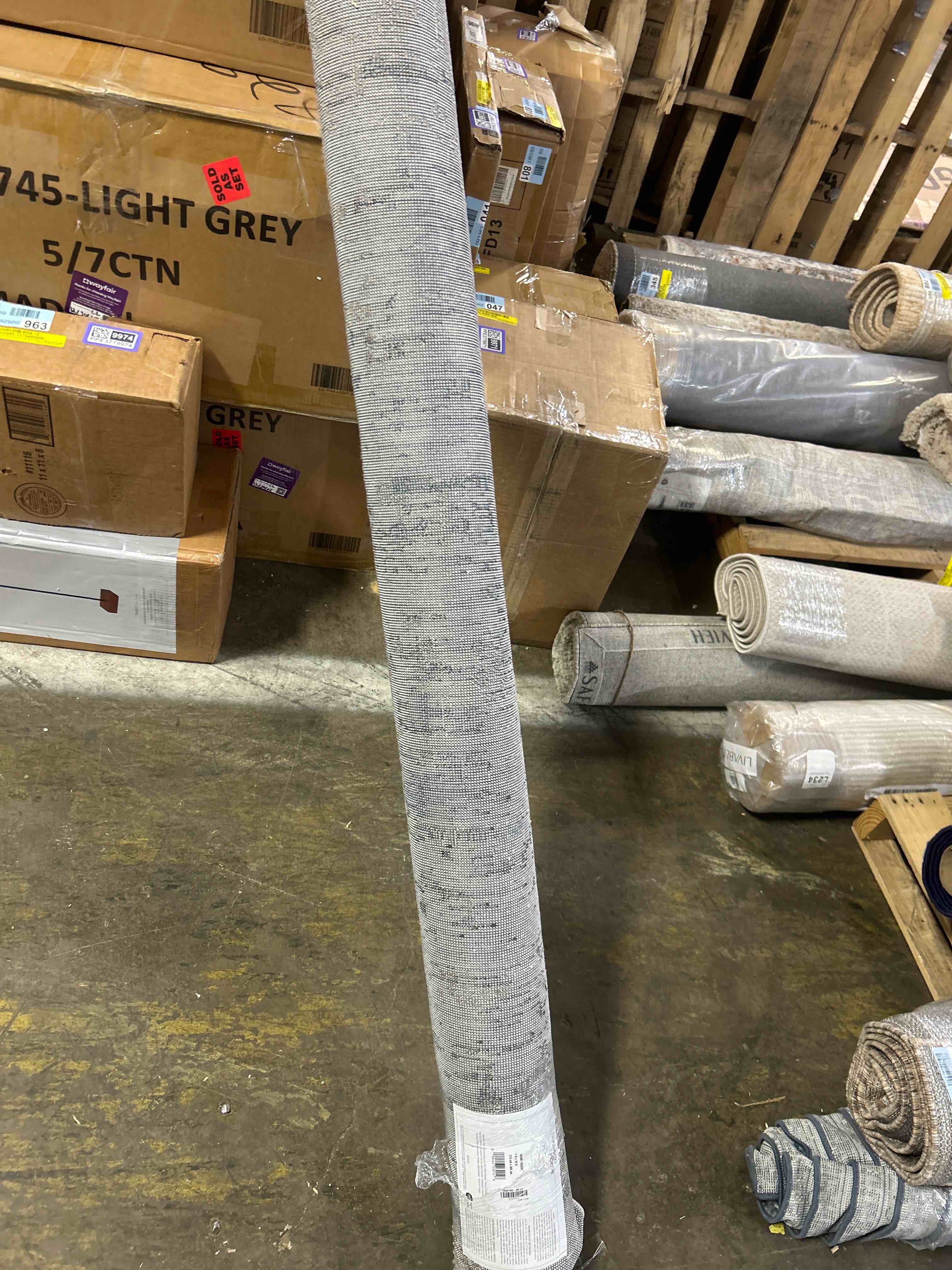 Condition photo showing New/Like New for Addie Abstract Modern Machine Woven Area in Beige/Gray 7” by 10”