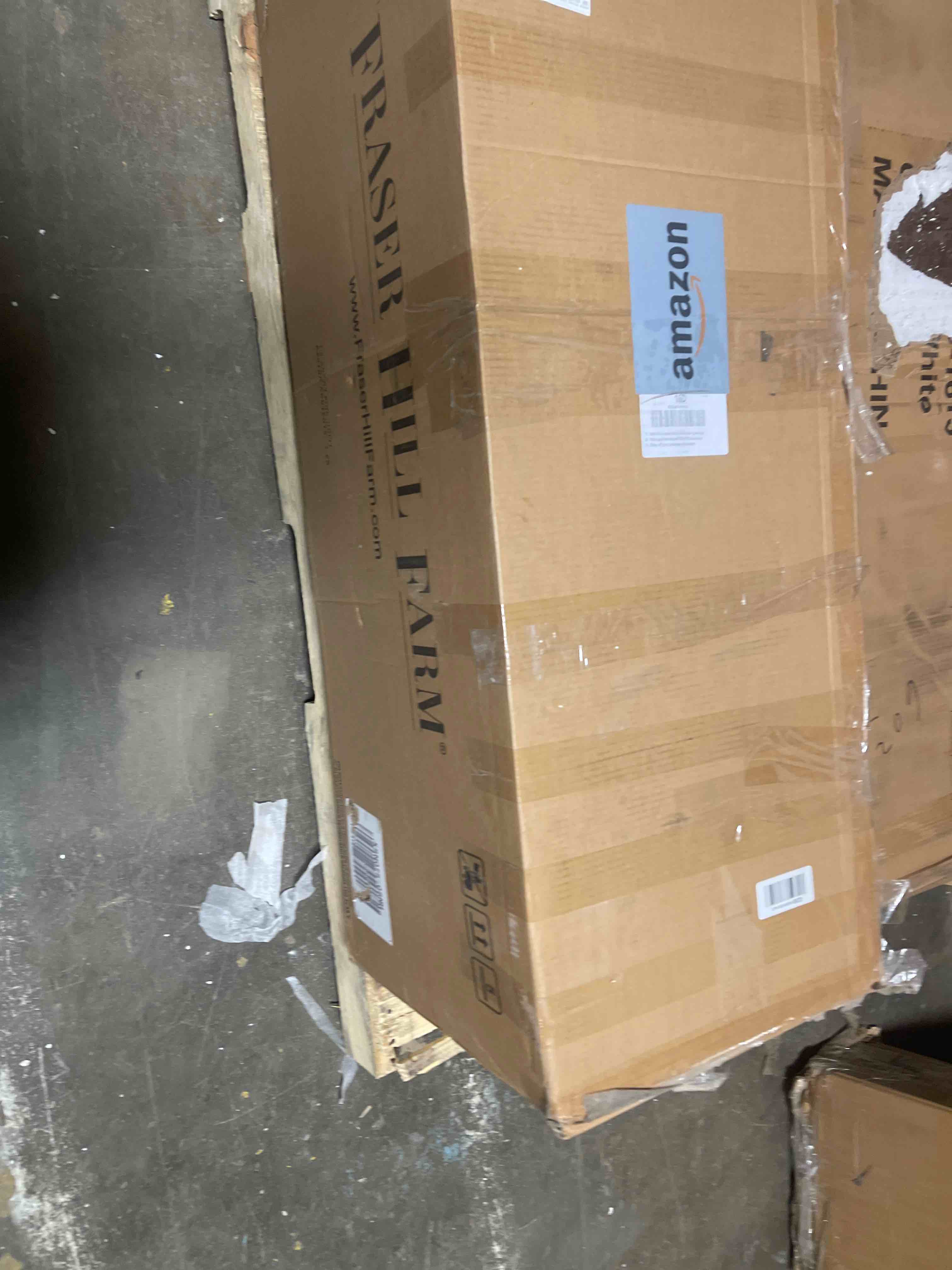 Condition photo showing New/Like New for National Tree Company 6 ft Pre-Lit Flocked Acacia Slim Artificial Christmas Tree, 250 Clear Lights, 512 Tips, Includes Stand, Green 5ft 11in