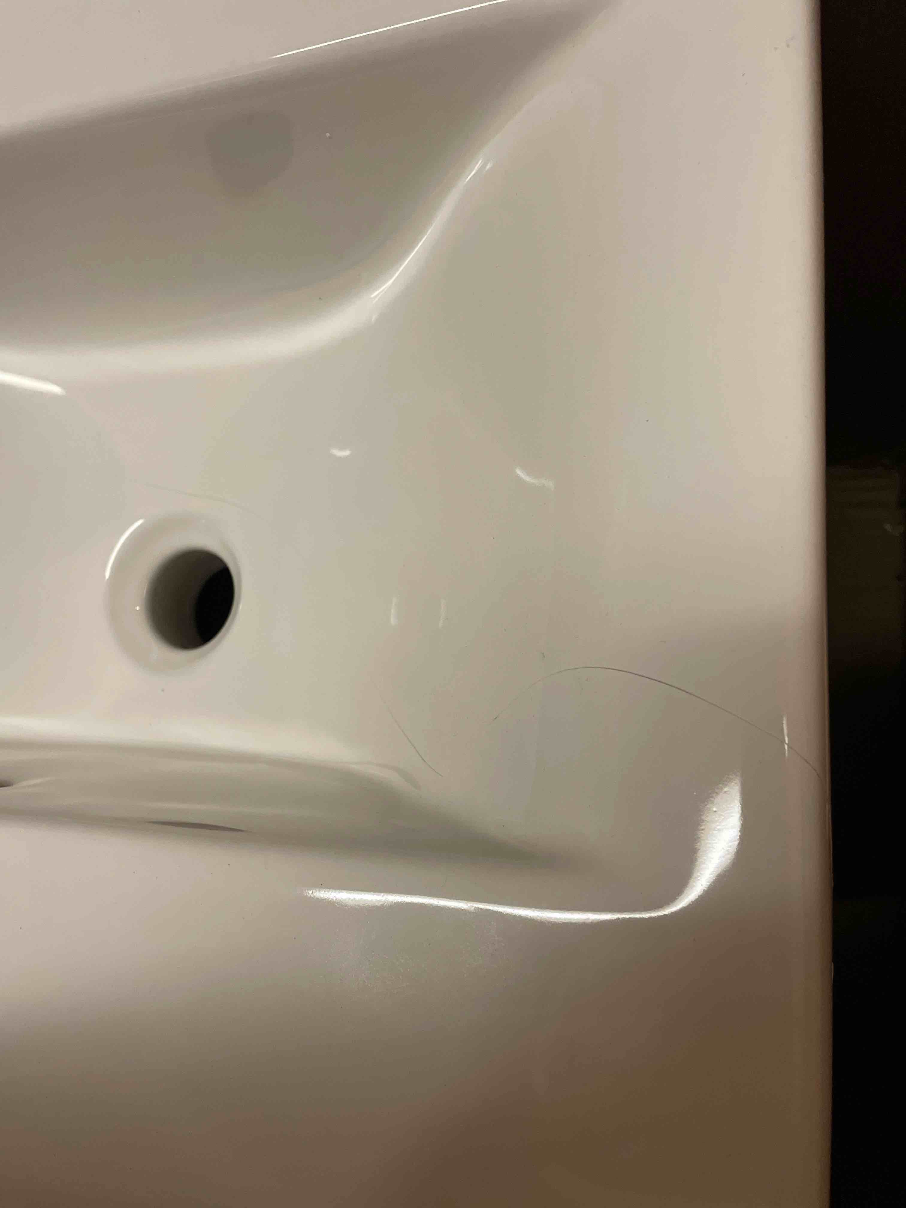 Condition photo showing As Is for Reynaldo 20"" Single Bathroom Vanity with Porcelain Top (damaged small crack )