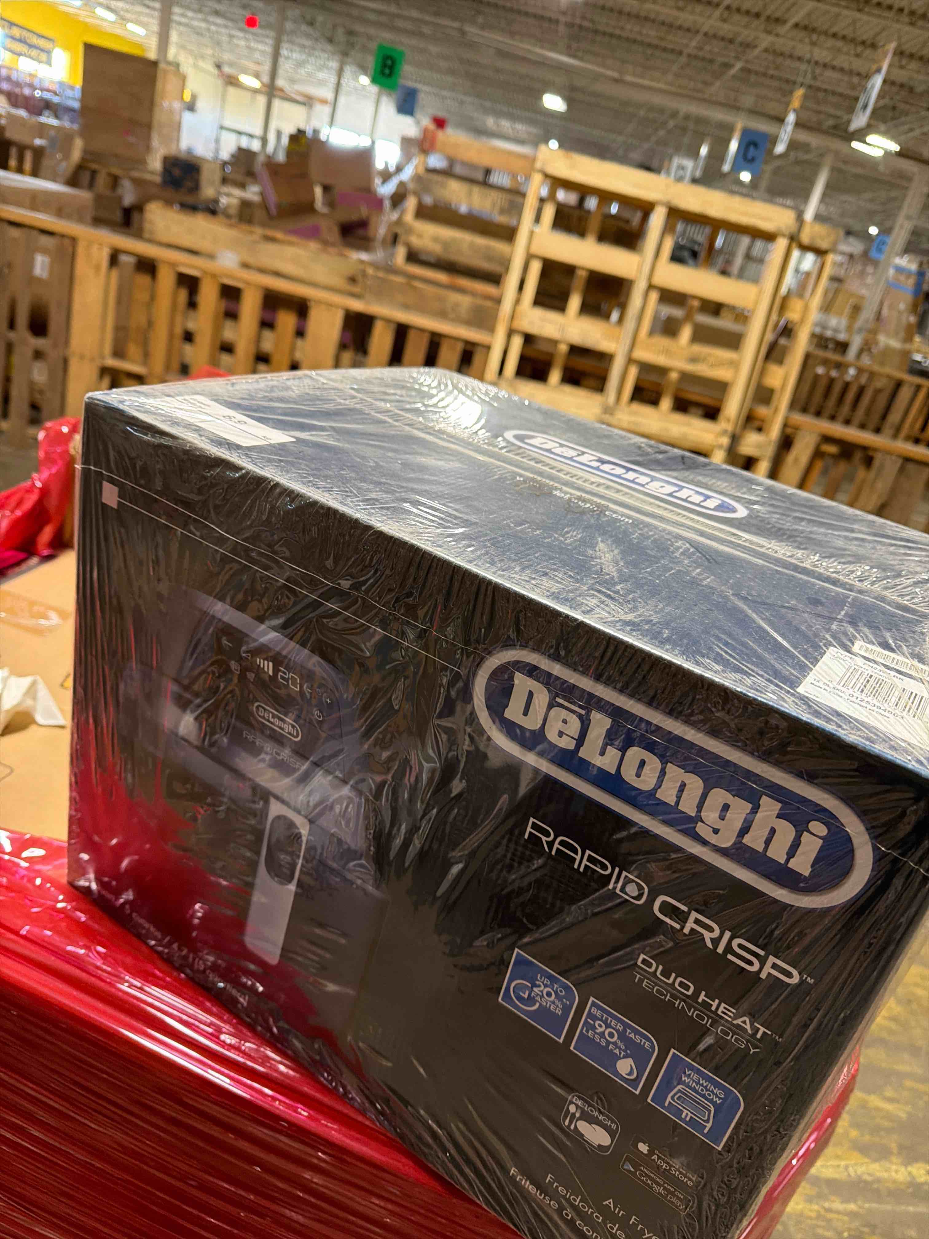 Condition photo showing New/Like New for De'Longhi Rapid Crisp Air Fryer, 5-Quart, 1700-Watt XL Cooker, Fries, Crisps, Roasts, Bakes, 5 Preset Functions, Pizza Setting, Up to 20% Faster Cooking, Easy Clean Nonstick, 360° Viewing, Black