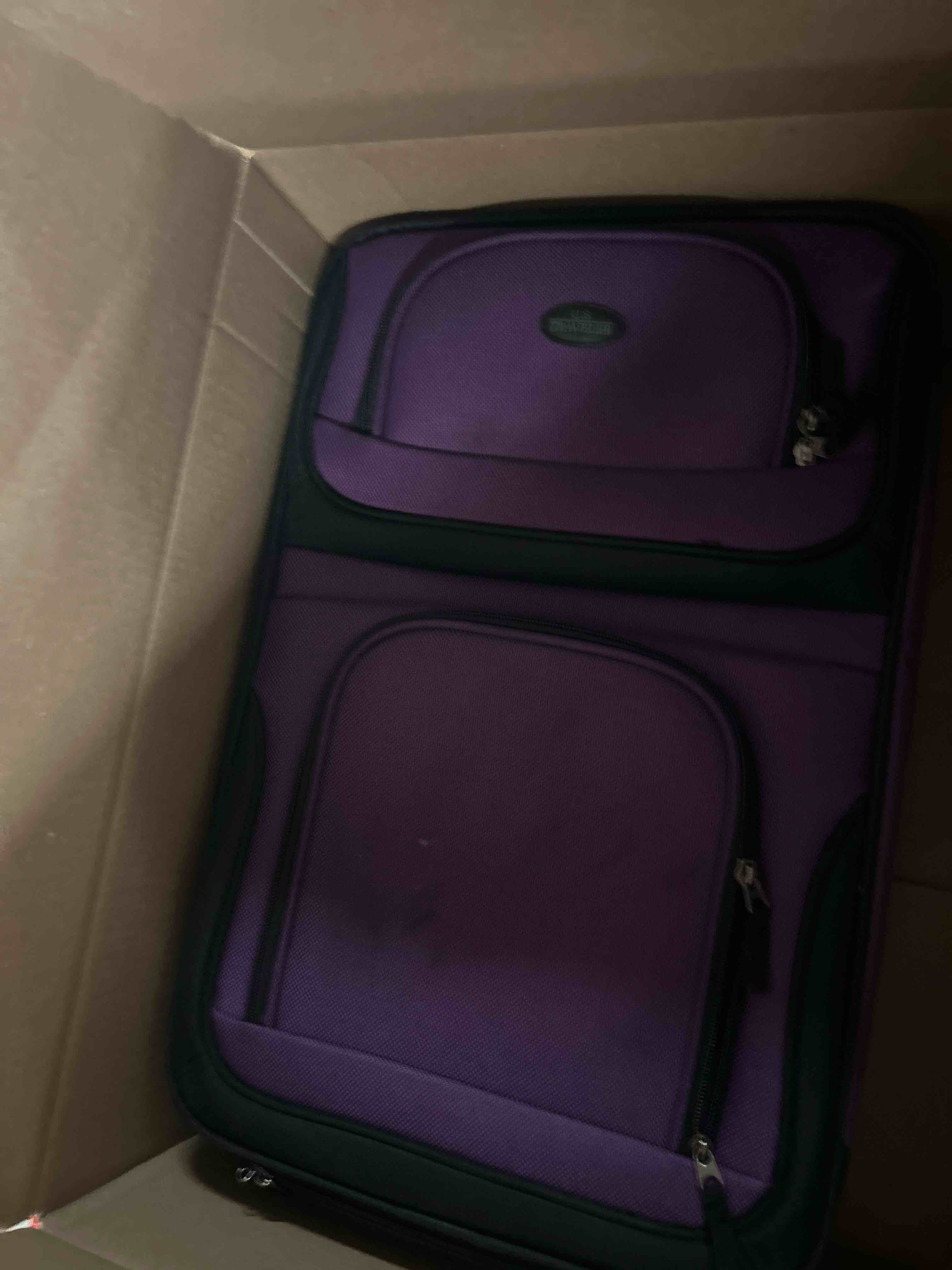 Condition photo showing New/Like New for (carry on only) u.s. traveler rio lightweight softside rolling carry-on suitcase, 2-wheel set, purple