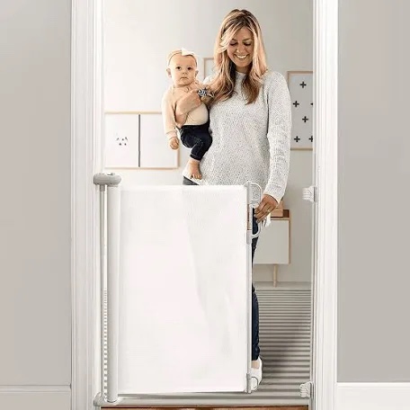 momcozy auto lock retractable baby gate, safety gate for baby and pet, 33” tall, extends to 55” wide, mesh safety dog gate for stairs, indoor, outdoor, doorways, hallways