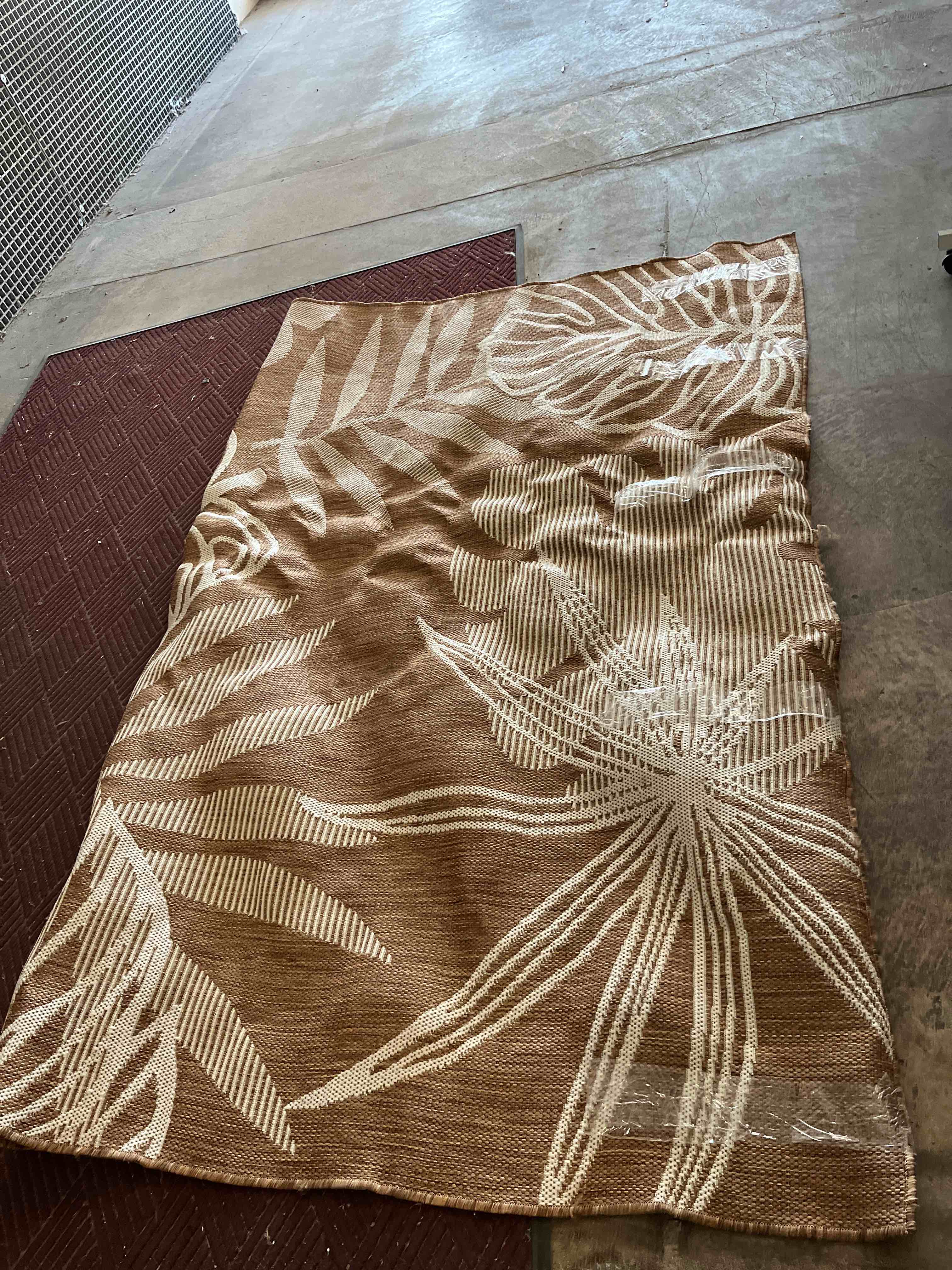 Condition photo showing New/Like New for pauwer waterproof outdoor rug 9x12 ft , plastic straw patio rug, floral brown | reversible camping rug, uv resistant indoor outdoor rv mat carpet for deck, camper, porch, balcony, backyard, picnic