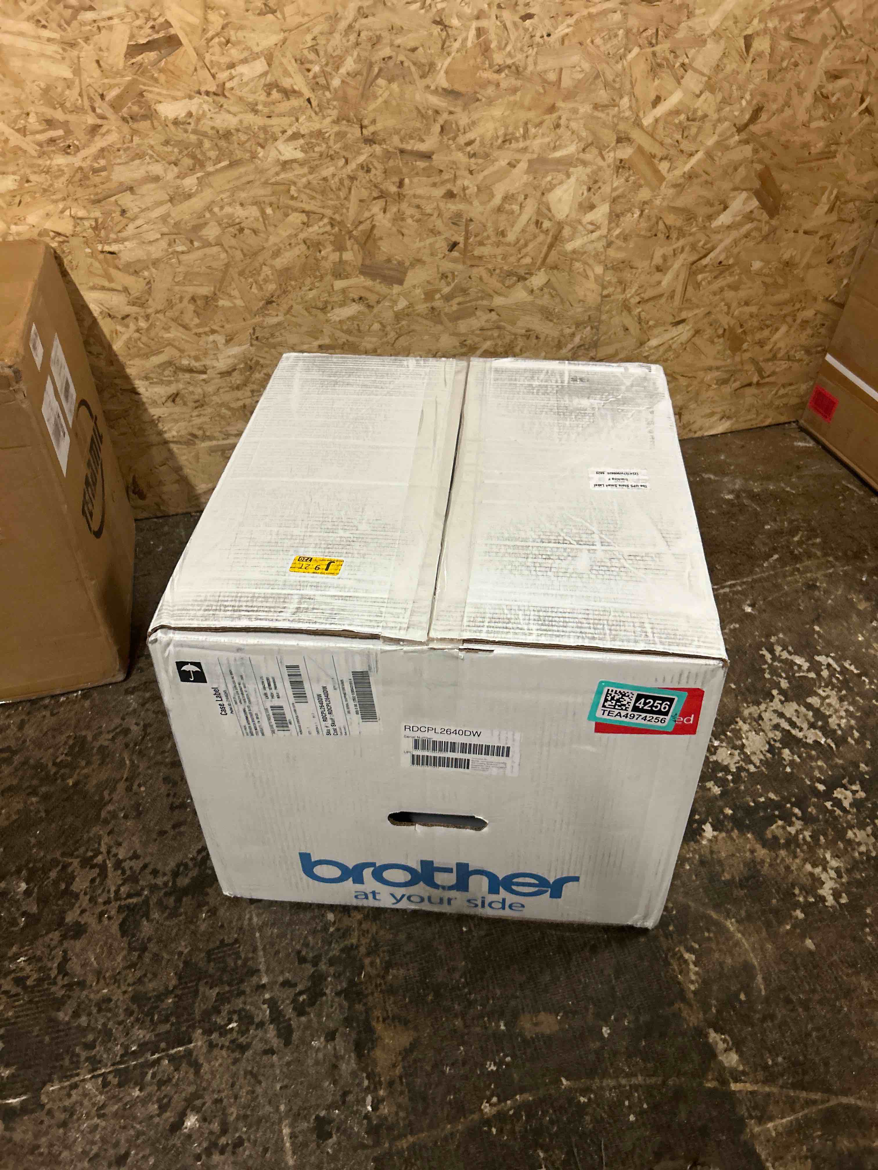 Condition photo showing New/Like New for brother dcp-l2640dw wireless compact monochrome multi-function laser printer with copy and scan, duplex, black & white output