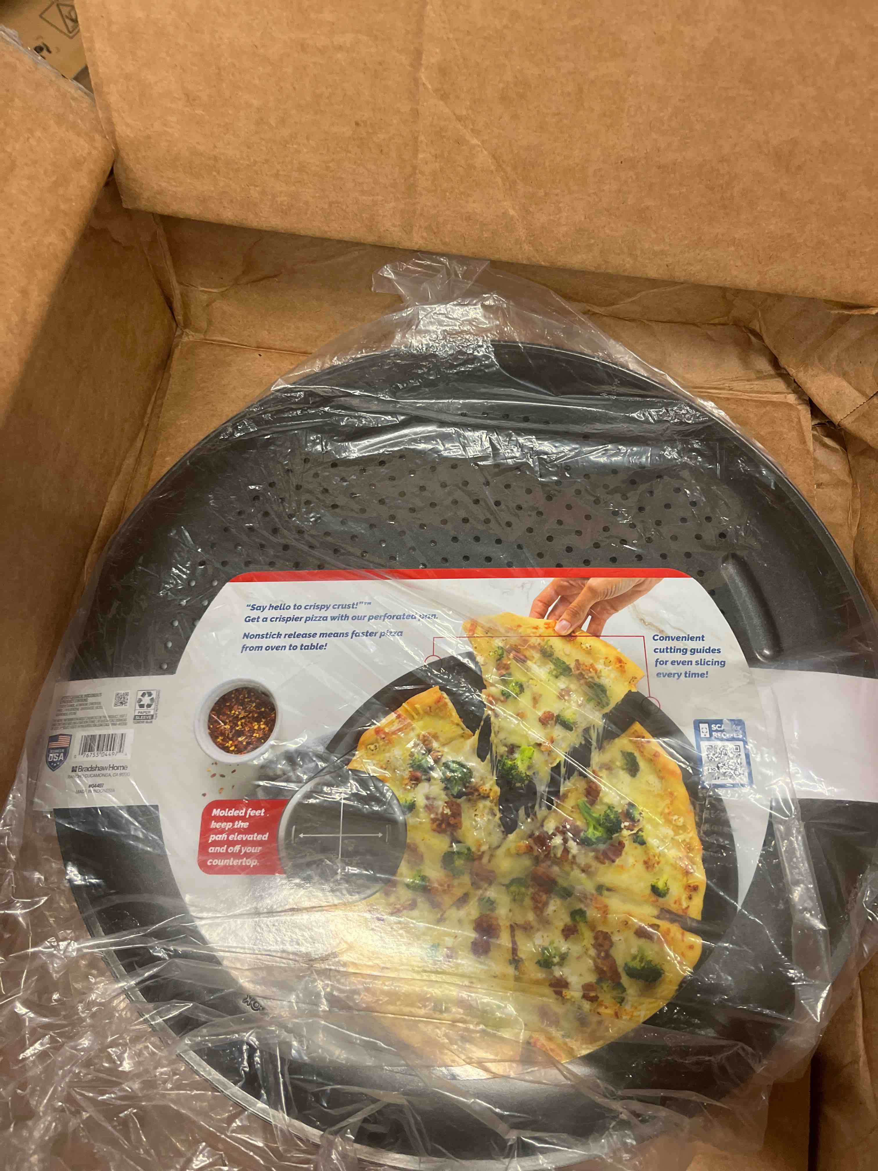 Condition photo showing New/Like New for goodcook airperfect insulated nonstick carbon steel pizza pan with cutting guides, perforated nonstick pizza pan, 15.75-inch, gray