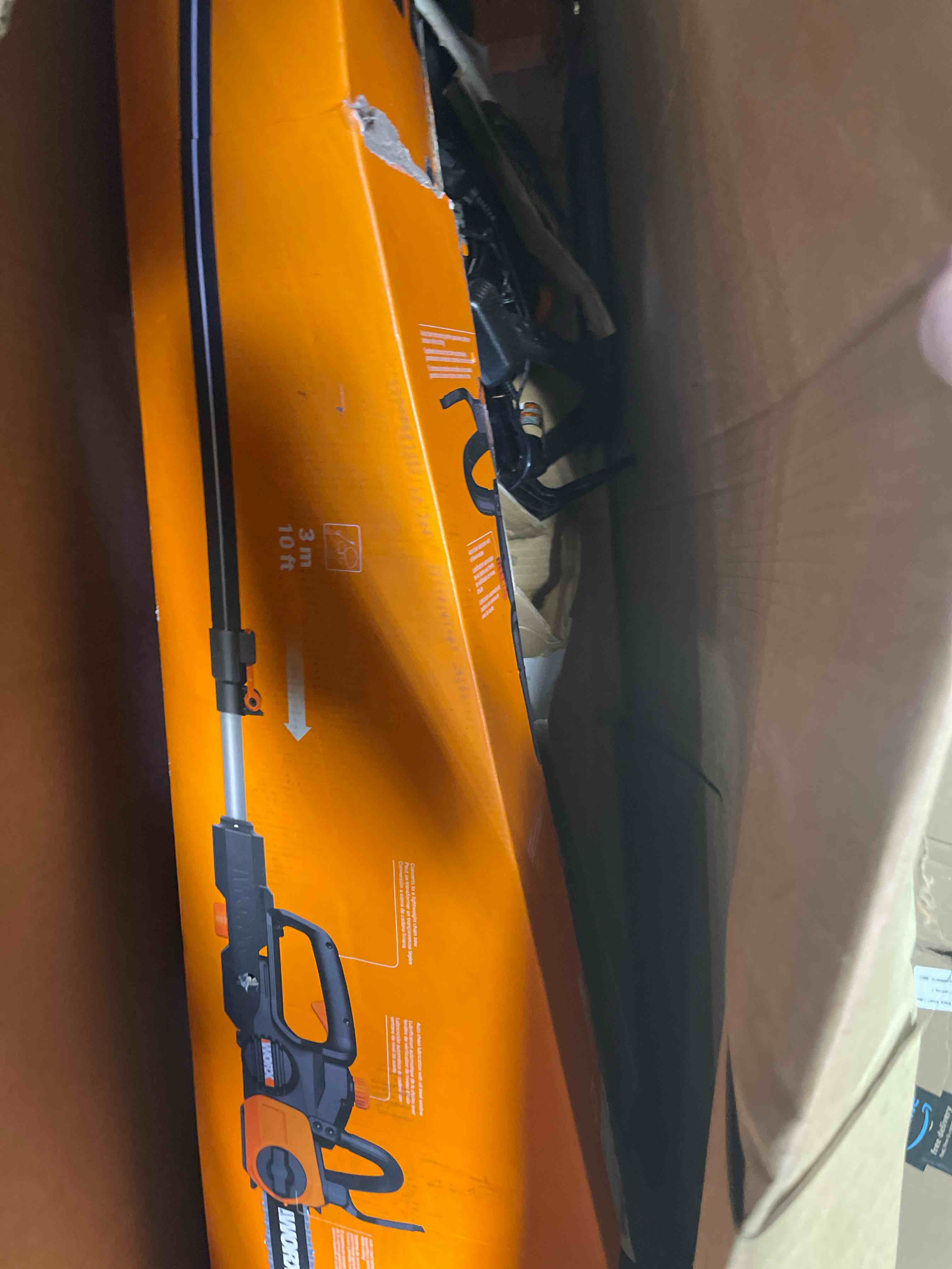 Condition photo showing As Is for worx wg323 20v power share 10" cordless pole/chain saw with auto-tension (battery & charger included) 20v 10'' cordless pole saw