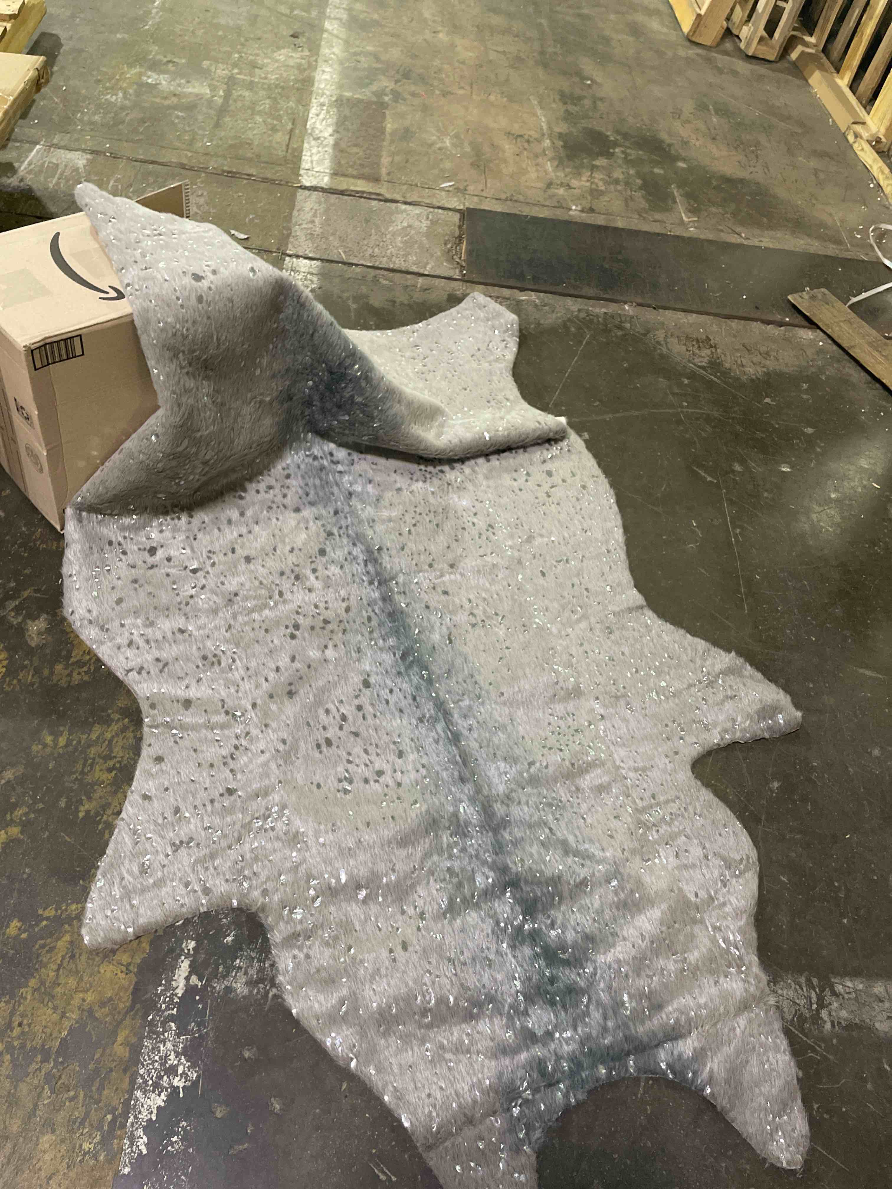 Condition photo showing Good Condition for safavieh faux cow hide collection 5' x 6' 5" dark grey/silver fch206h rustic western boho living room dining bedroom area rug