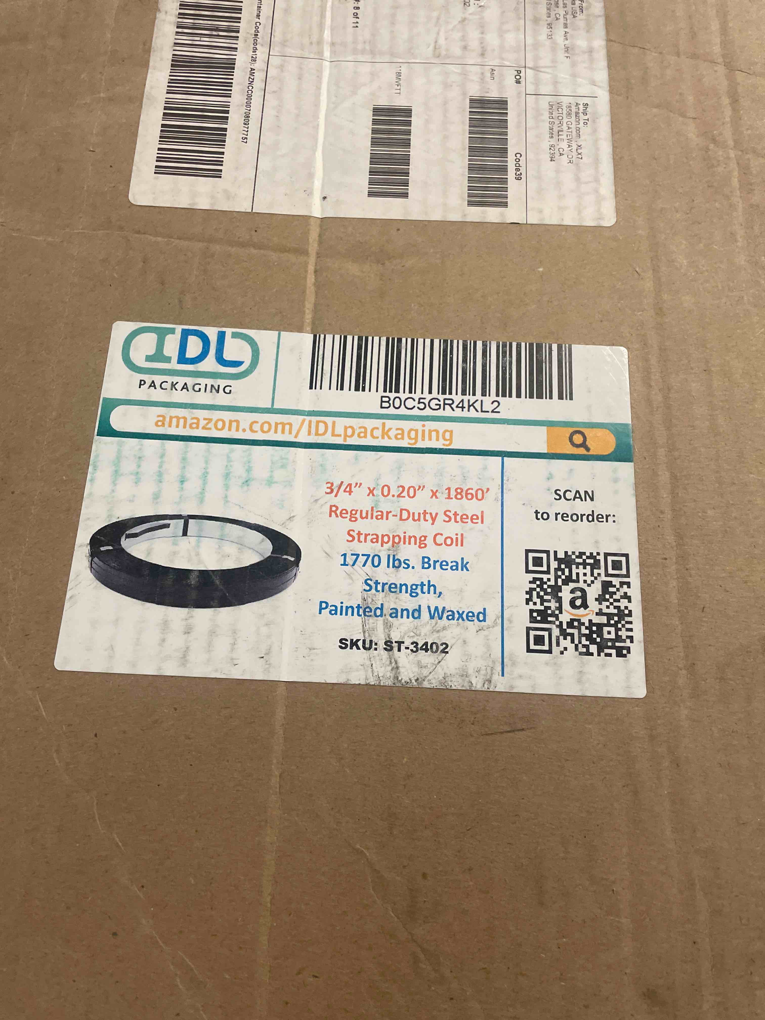 Condition photo showing New/Like New for idl packaging 3/4" x .020" x 1860' regular-duty steel strapping coil (1770 lbs break strength) - painted and waxed - superior cut-resistance - metal straps for pallet banding, extra-heavyweight loads