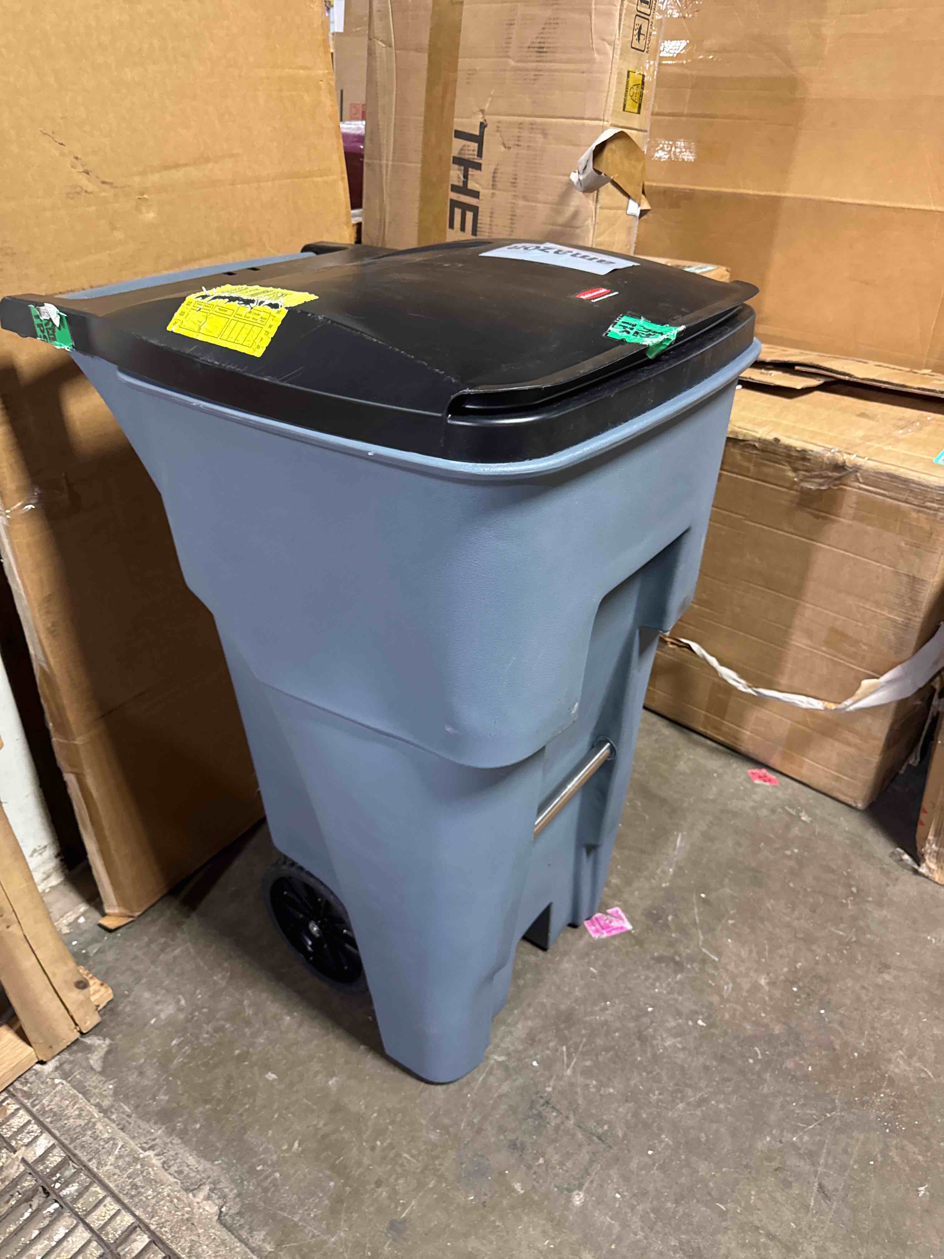 Condition photo showing New/Like New for rubbermaid commercial products brute rollout plastic trash/garbage can/bin with wheels 65 gal for restaurants/hospitals/offices/back of house/warehouses/home gray 65g single