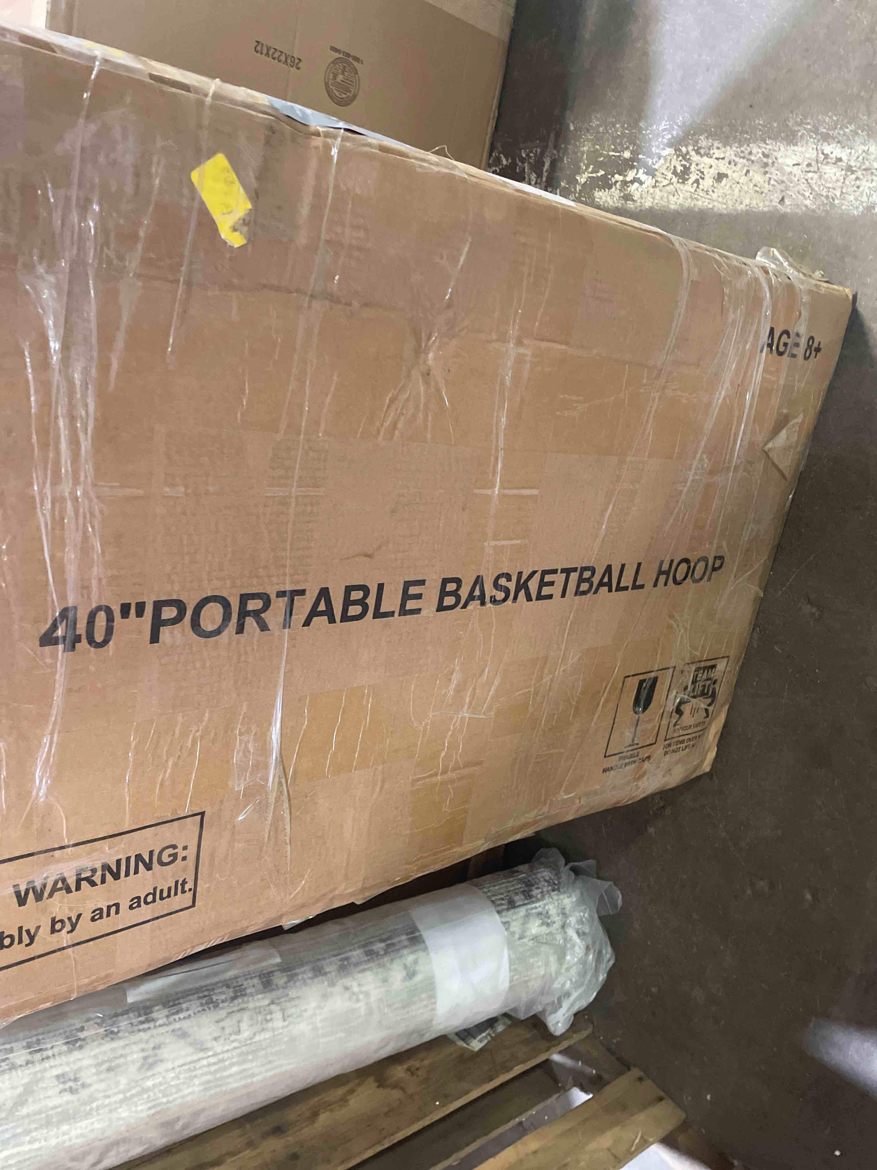 Condition photo showing As Is for igl portable basketball hoop, 5.6-10ft adjustable basketball goal system, 40/44 inch outdoor basketball hoop & goals for kids, youth, and adults in the backyard, driveway with pc backboard