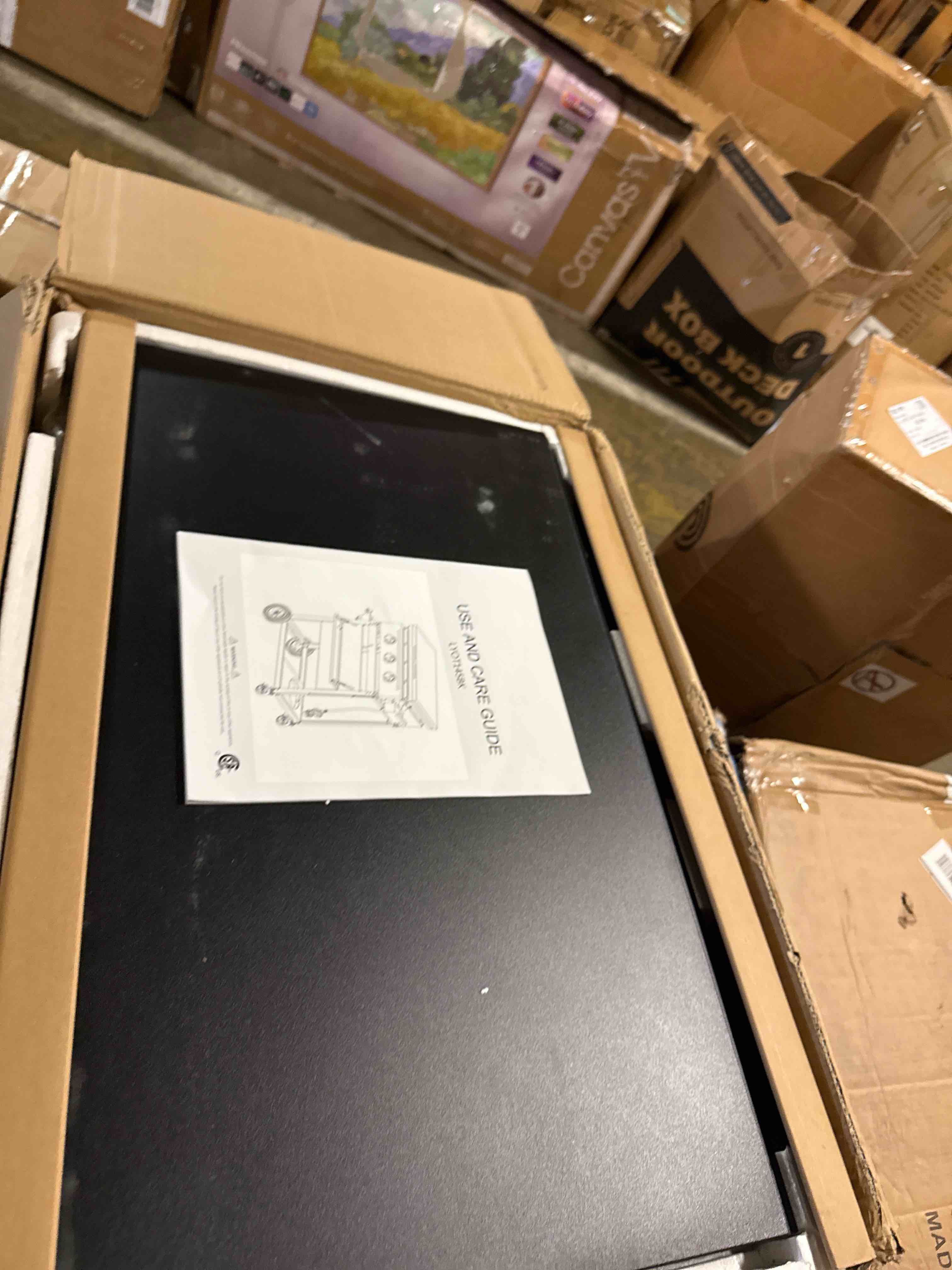 Condition photo showing New/Like New for mellcom 3 burner 30000 btu outdoor gas griddle with lid (side shelf), portable flat top griddle 28 inch heavy- duty cast lron grill, bottle rack & grease pan for camping, picnic, patio