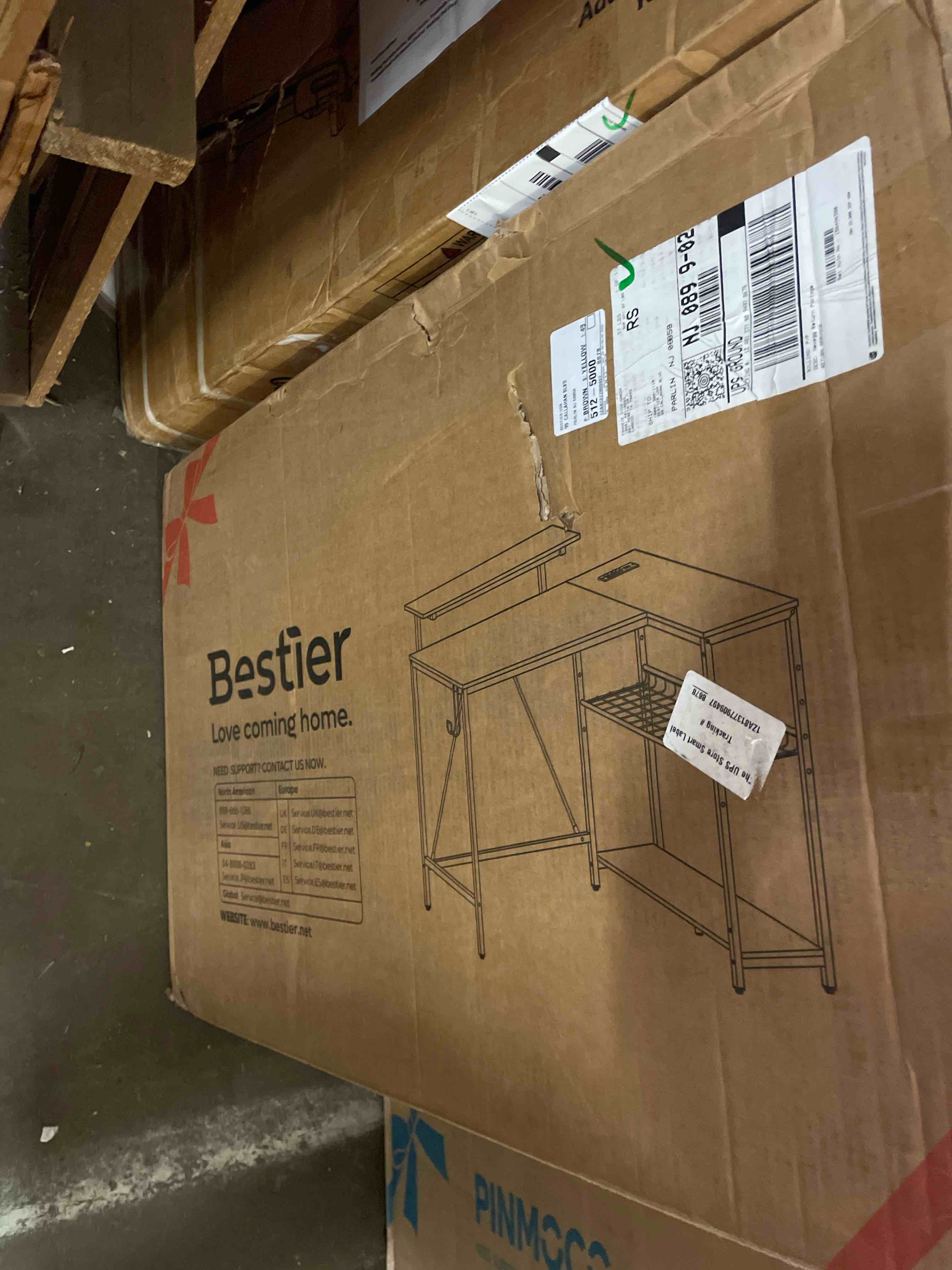 Condition photo showing New/Like New for bestier gaming desk with power outlets, 42" l-shaped computer desk with led lights, desk with reversible storage shelves & hooks for small spaces, bedrooms & offices, black carbon fiber