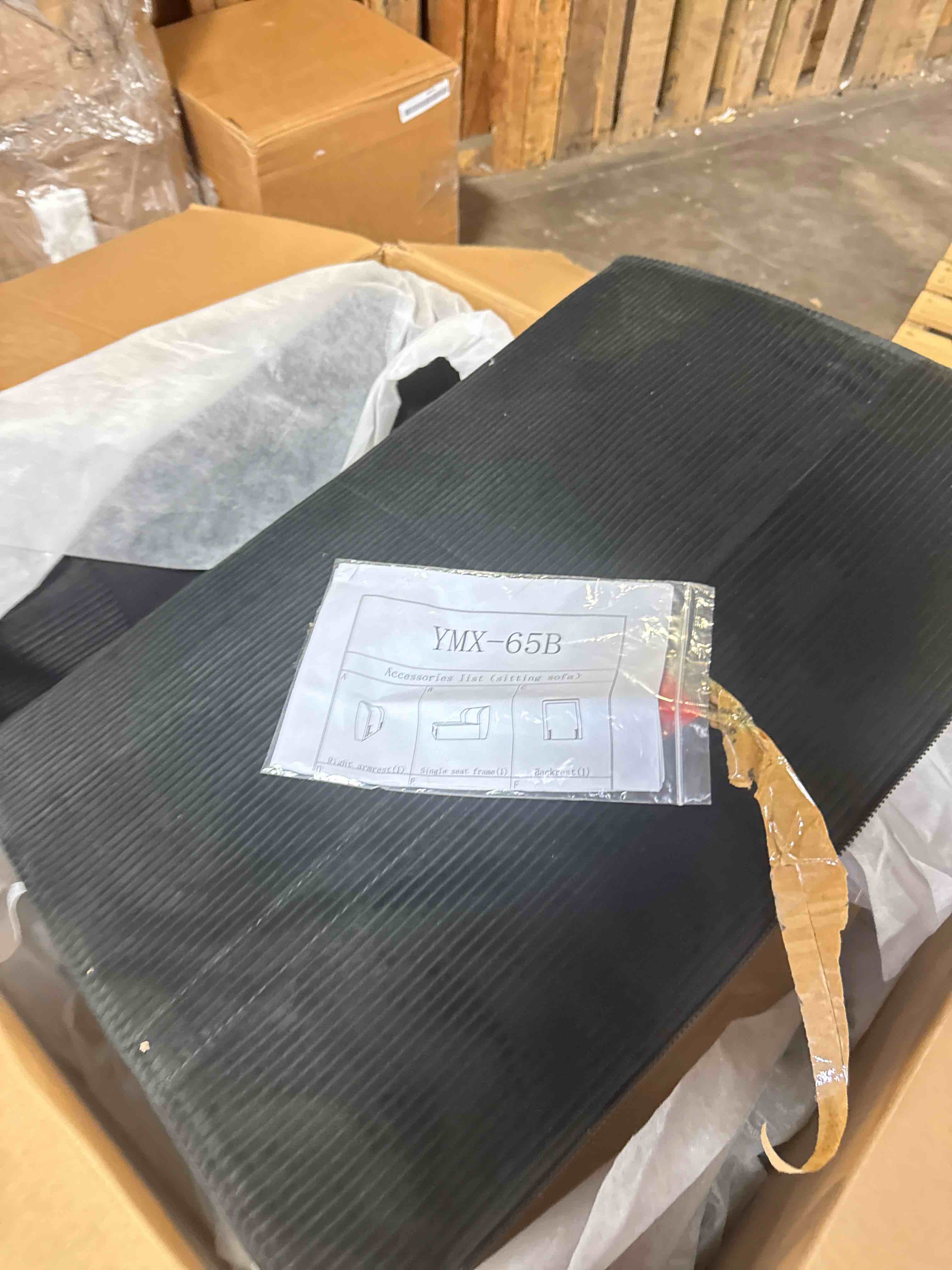 Condition photo showing New/Like New for single black corduroy sofa (similar)