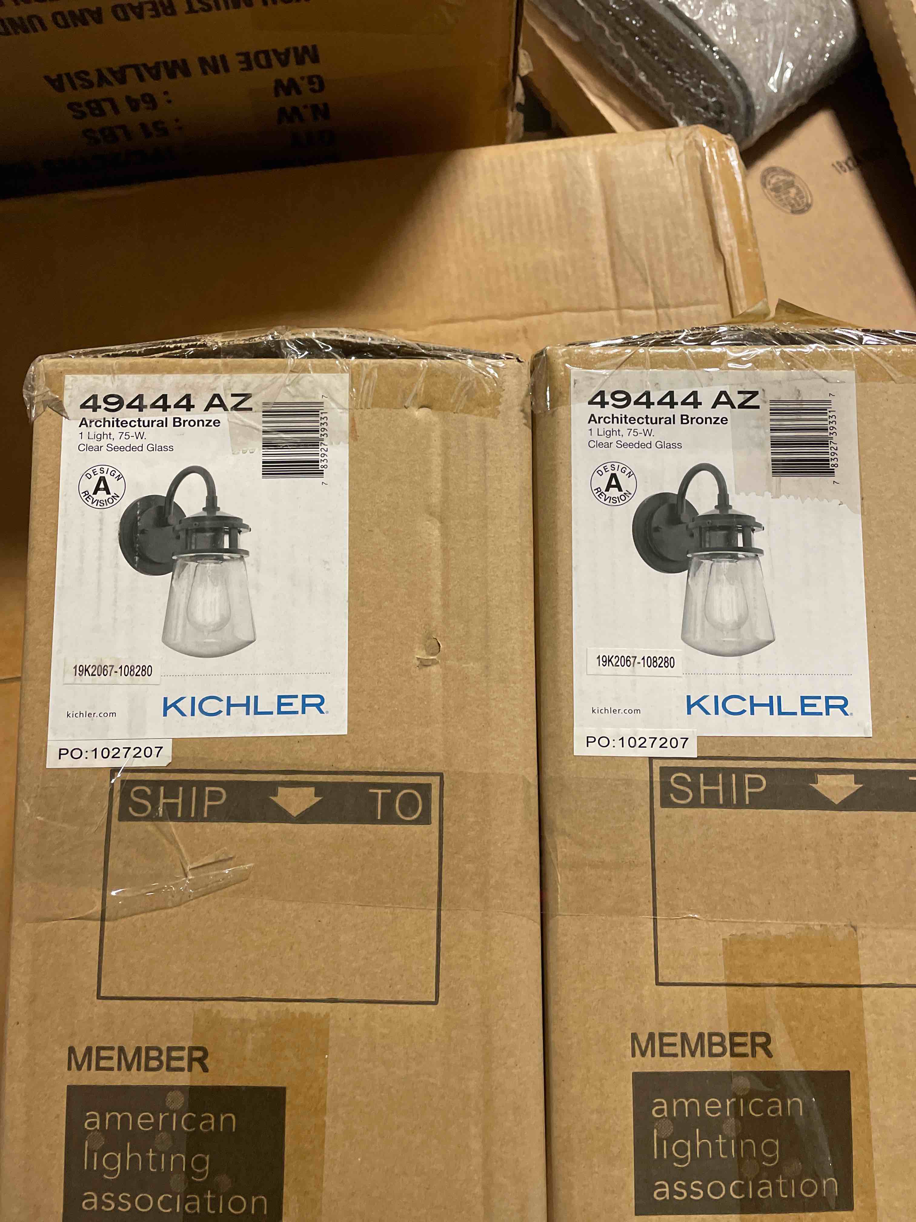 Condition photo showing New/Like New for kichler lyndon 11.25" wall sconce in architectural bronze, 1-light indoor outdoor wall light with clear seeded, (11.25" h x 5" w), 49444az (set of 2)
