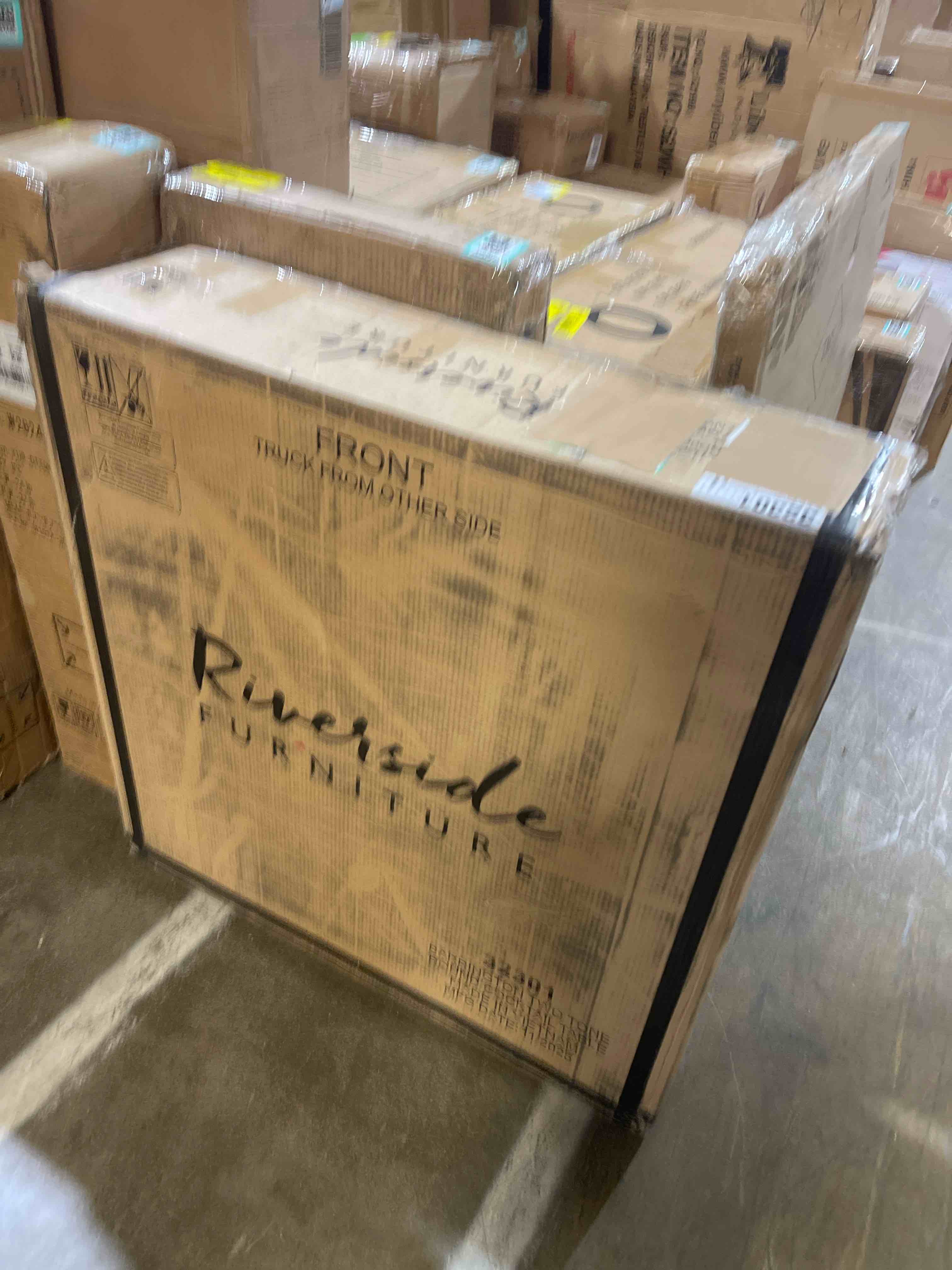 Condition photo showing New/Like New for riverside furniture barrington antique oak round coffee table with matte black base