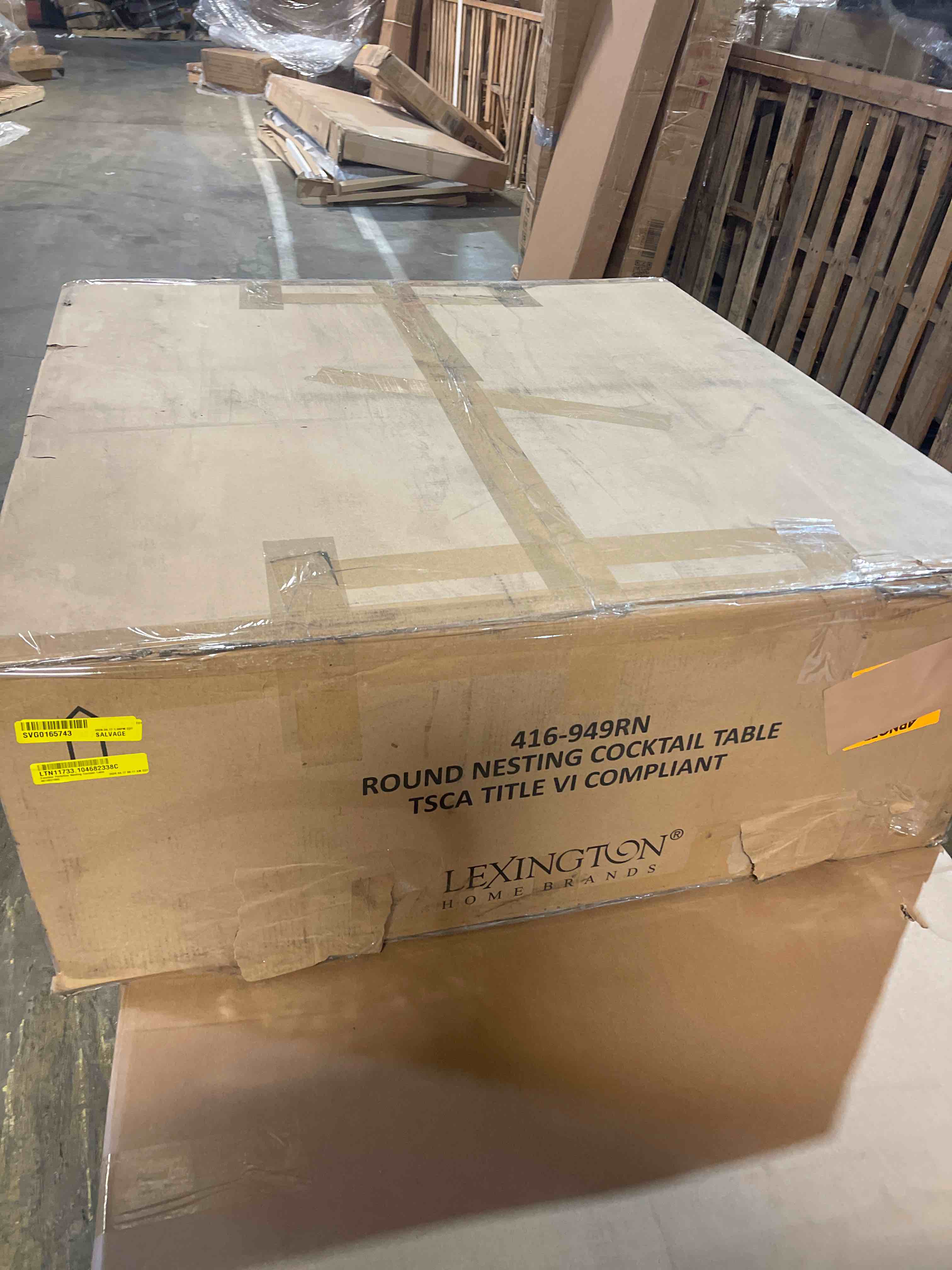 Condition photo showing As Is for zanzibar portofino nesting cocktail table