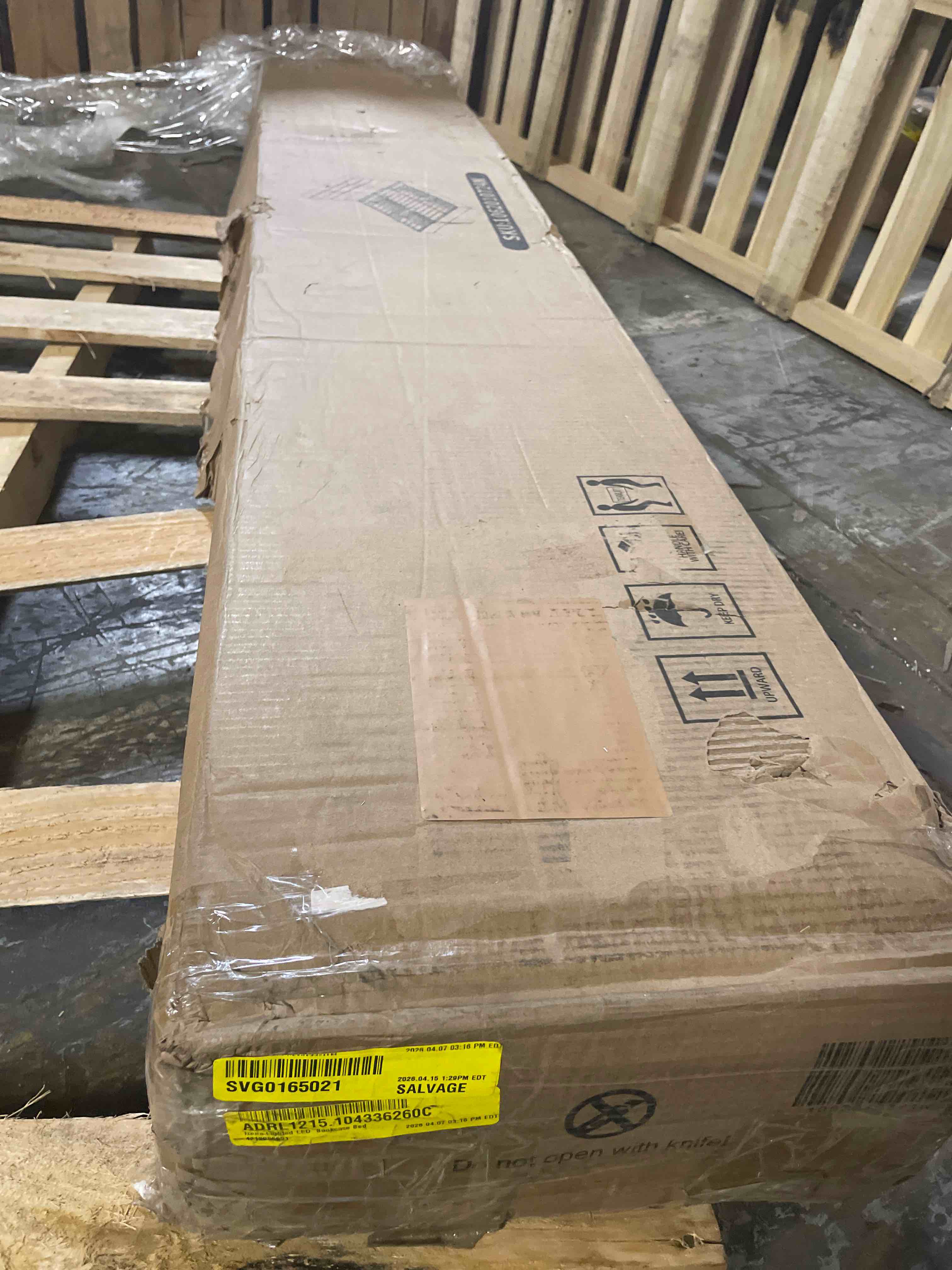 Condition photo showing As Is for only one box to izena lighted led bookcase bed