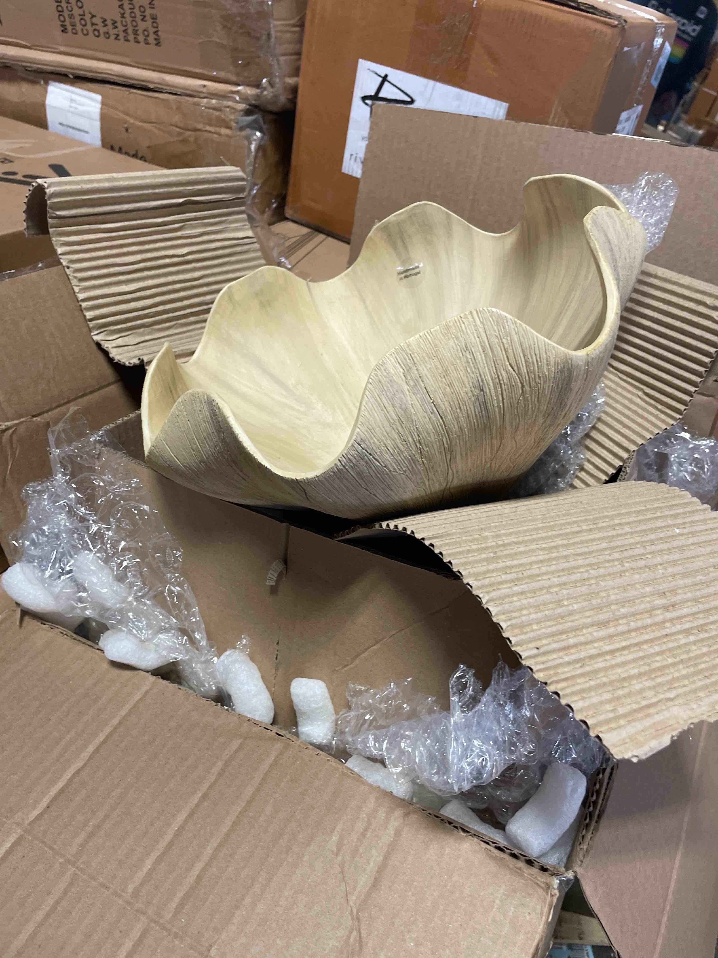 Condition photo showing Good Condition for this item is an urban nature culture hera decorative bowl, a sculptural, ruffled bowl made of mangowood or earthenware.
