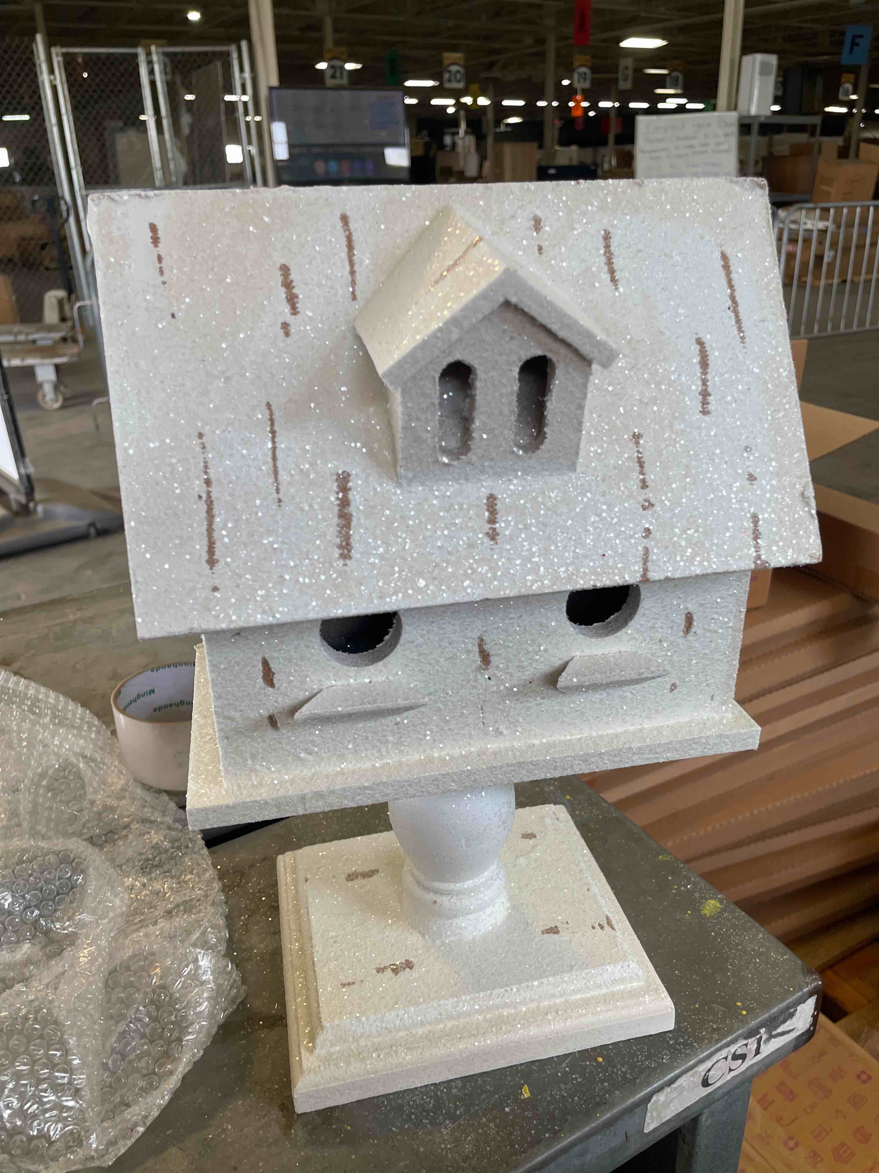 Condition photo showing New/Like New for glittery wooden birdhouse 